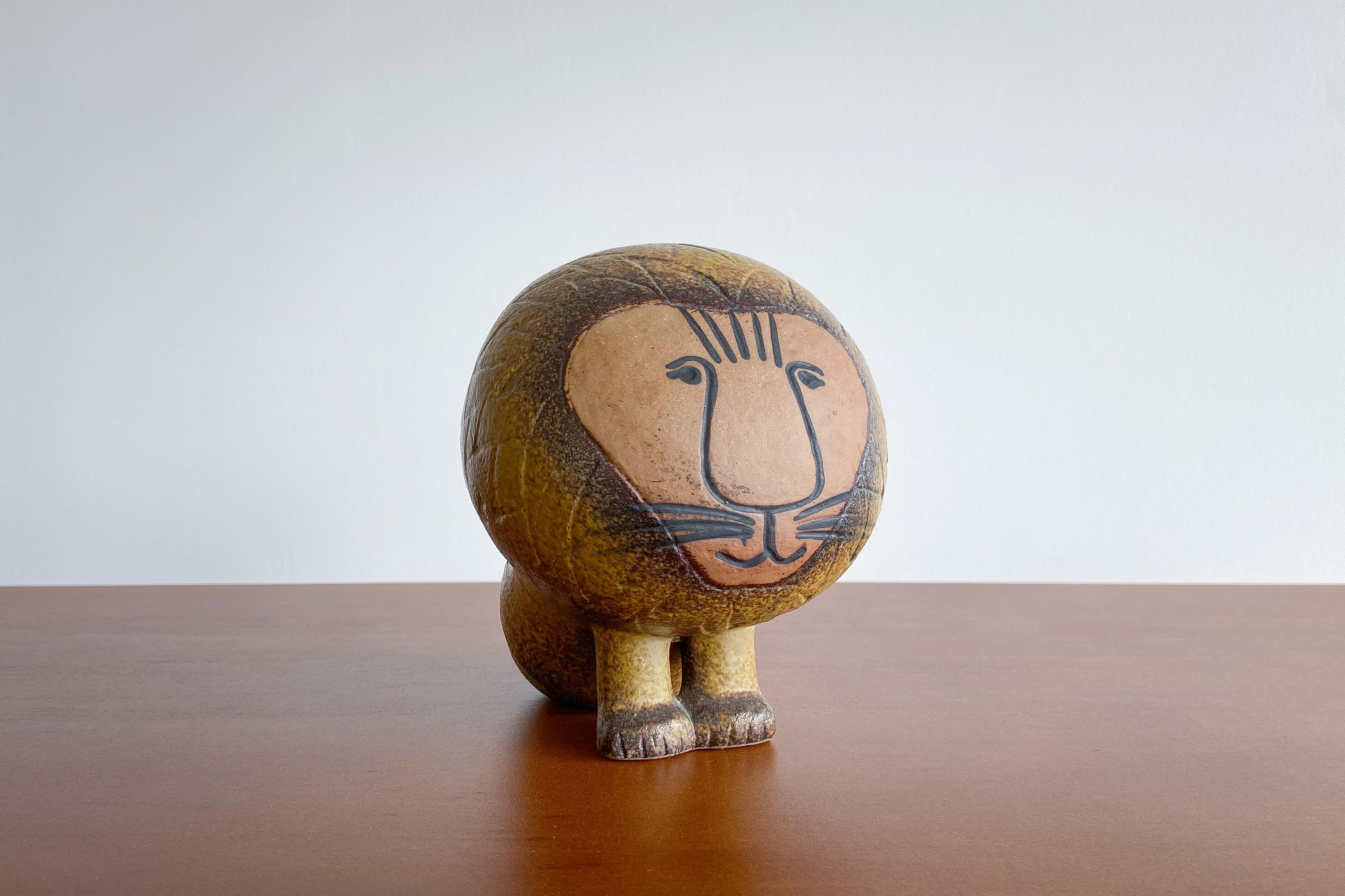 A fun and whimsical ceramic lion by famed ceramic artist Lisa Larsen for Gustavsberg's 