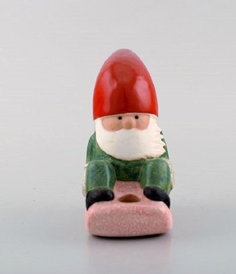 Lisa Larson for Gustavsberg. Candleholder. Elf on a sledge in glazed stoneware, late 20th century.
In very good condition.
Signed.
Measures: 16 x 10.5 cm.
        