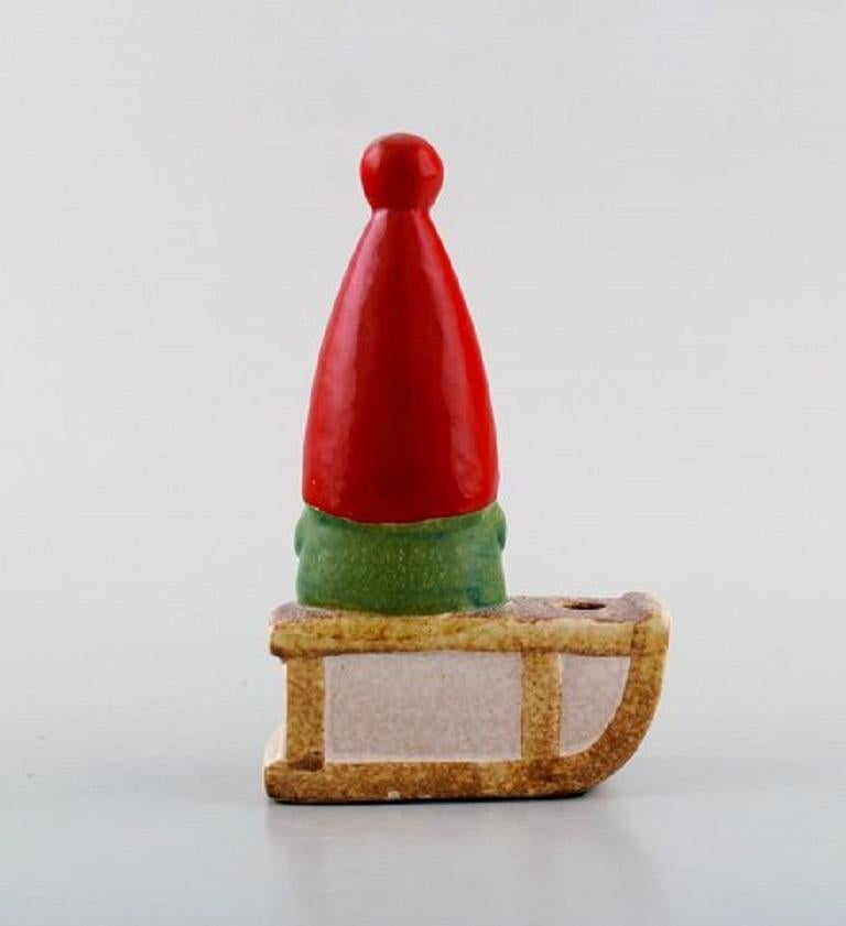 Lisa Larson for Gustavsberg. Candlestick. Elf in glazed stoneware. Dated 1995.
In very good condition.
Signed and dated.
Measures: 16 x 10 cm.
  