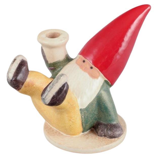 Lisa Larson for Gustavsberg. Ceramic candlestick. Elf on skates. Late 20th C. For Sale