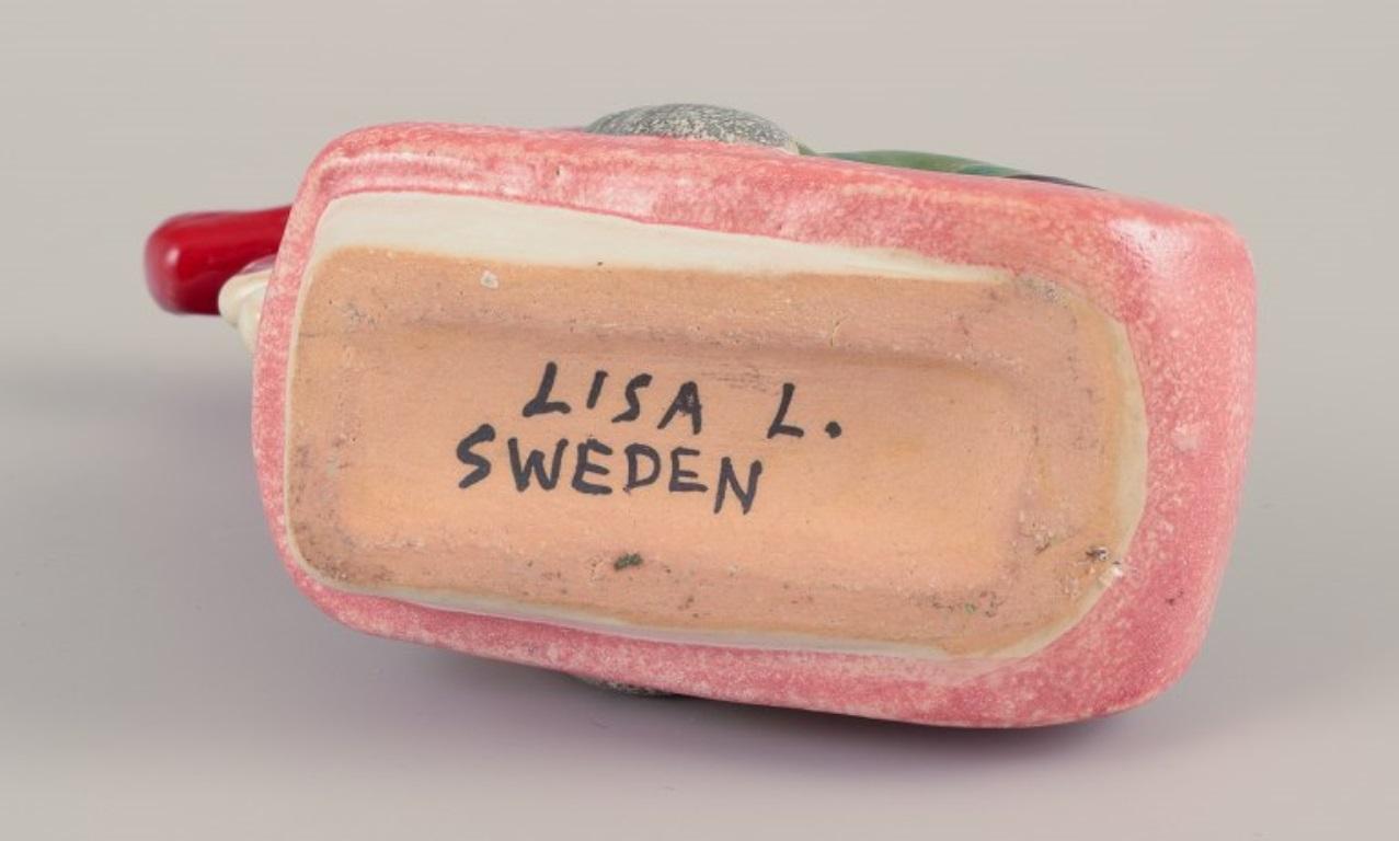 Lisa Larson for Gustavsberg. Ceramic candlestick. Elf on sledge. Late 20th C. In Excellent Condition For Sale In Copenhagen, DK