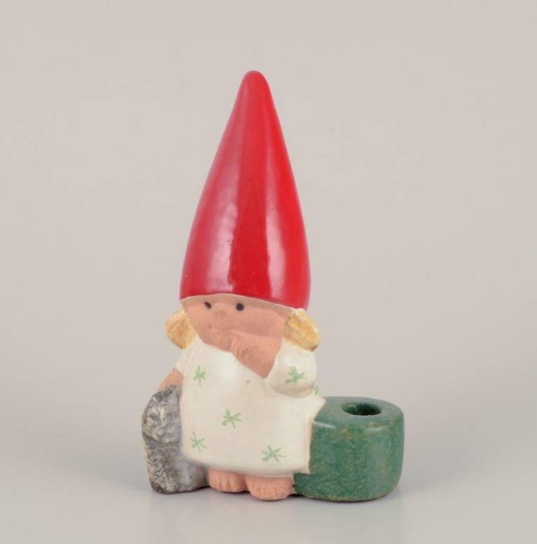 Lisa Larson for Gustavsberg.
Ceramic candlestick.
Girl elf and cat.
Late 20th century.
In perfect condition.
Signed.
Dimensions: W 8.5 cm x H 13.5 cm.
