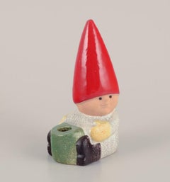 Lisa Larson for Gustavsberg. Ceramic candlestick. Sitting elf.  Late 20th C.