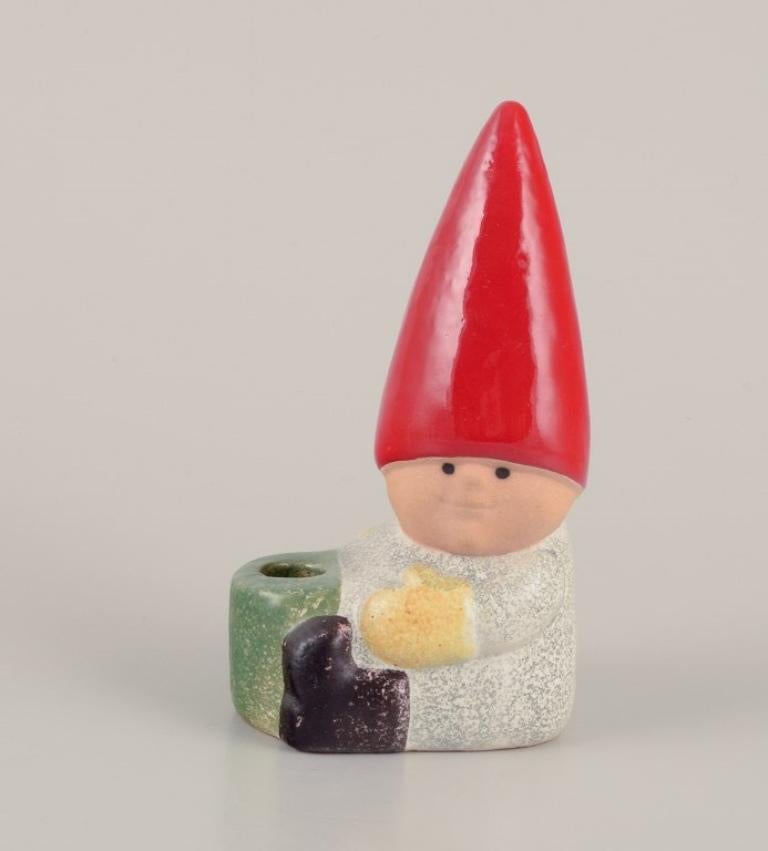 Lisa Larson for Gustavsberg. Ceramic candlestick. Sitting elf.  Late 20th C.