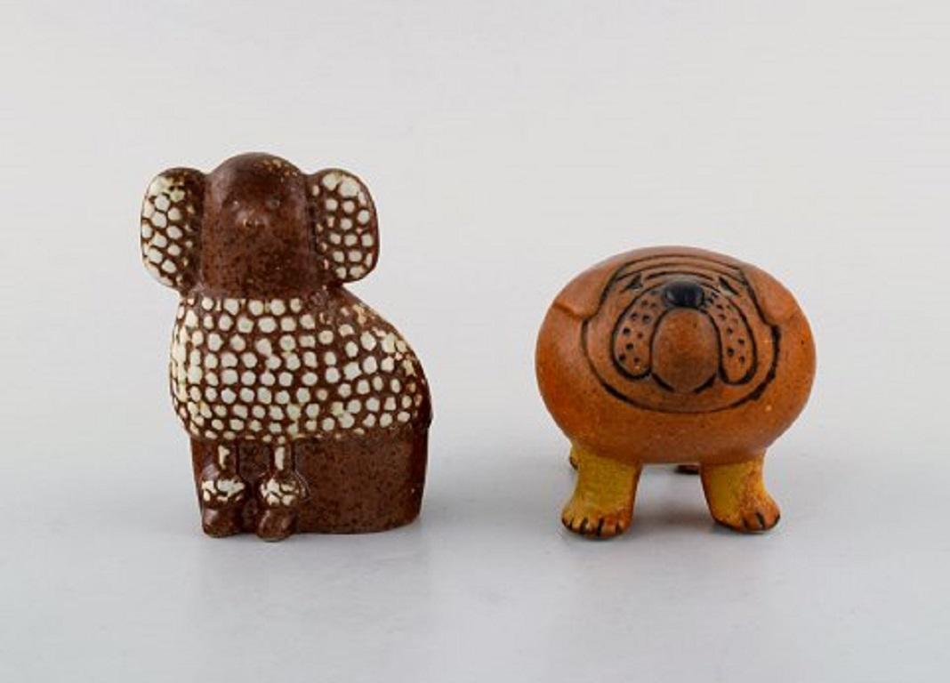 Lisa Larson for Gustavsberg. Five dogs in glazed ceramics. Poodle, bulldog, Pekingese and others, 1970s.
Largest measures: 7.5 x 7 cm.
In very good condition.
Signed.