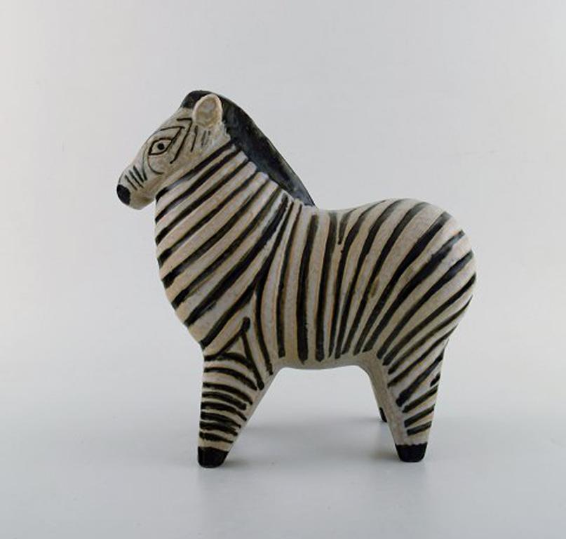 Lisa Larson for Gustavsberg. Rare zebra in ceramics.
Lisa Larson is best known for her humorous and friendly characters.
Measures: 24 cm x 23 cm.
In perfect condition.
Stamped.