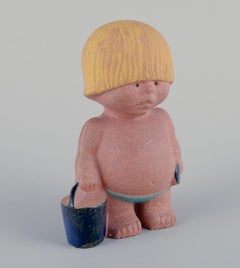 Lisa Larson for Gustavsberg. Stoneware figurine. Boy with a bucket.