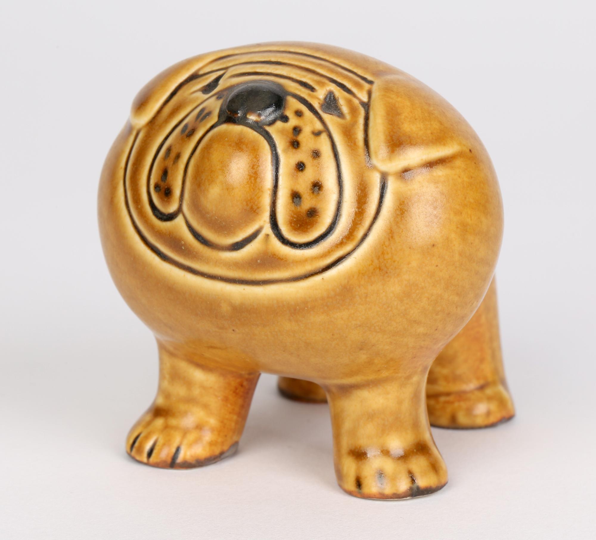 A delightful Swedish art pottery bulldog figure designed by illustrious Swedish ceramic artist Lisa Larson (Swedish, b.1931) and dating from the 1970’s. This fine standing figure typifies the humorous nature of Lisa’s work and has incised facial