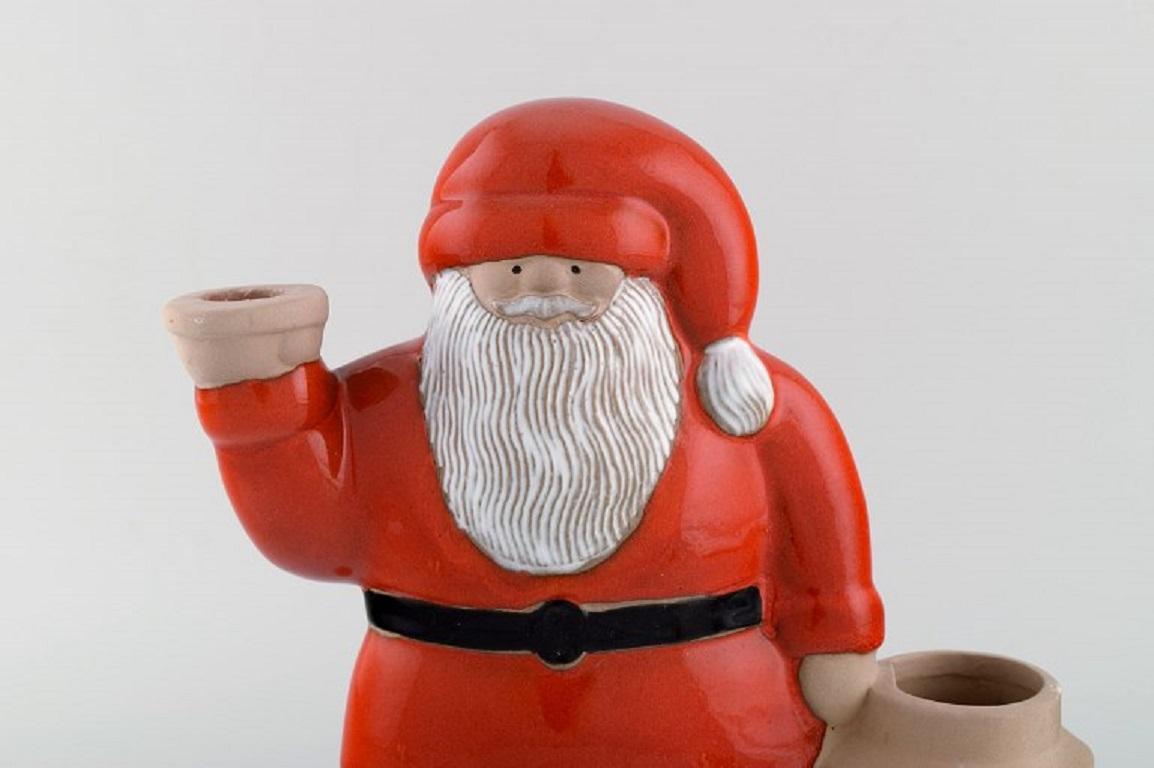 Lisa Larson for Jie. Large rare Santa Claus in glazed ceramics with a lantern for a tealight candle. 
Swedish design, late 20th century.
Measures: 25 x 24.5 cm.
In excellent condition.
Stamped.