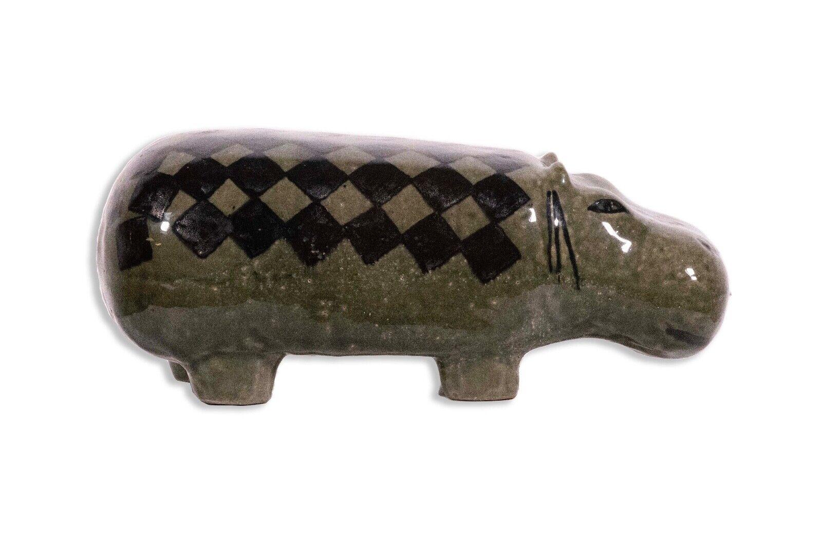 A whimsical and quintessentially modern ceramic figurine sculpture depicting a friendly hippo by Swedish ceramicist and designer Lisa Larson. Designed in 1958 for the Gustavsberg Factory and part of the 