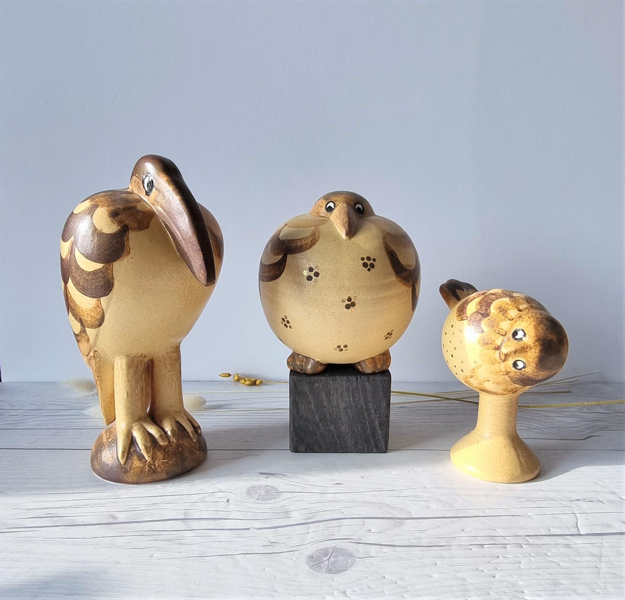 This trio of sweetly adorable and hand-decorated bird sculptures is by leading Swedish ceramicist and designer Lisa Larson (b. 1931 - ) designed in the early 1990s. Originally designed for Larson's exhibition, the production of the figures were by