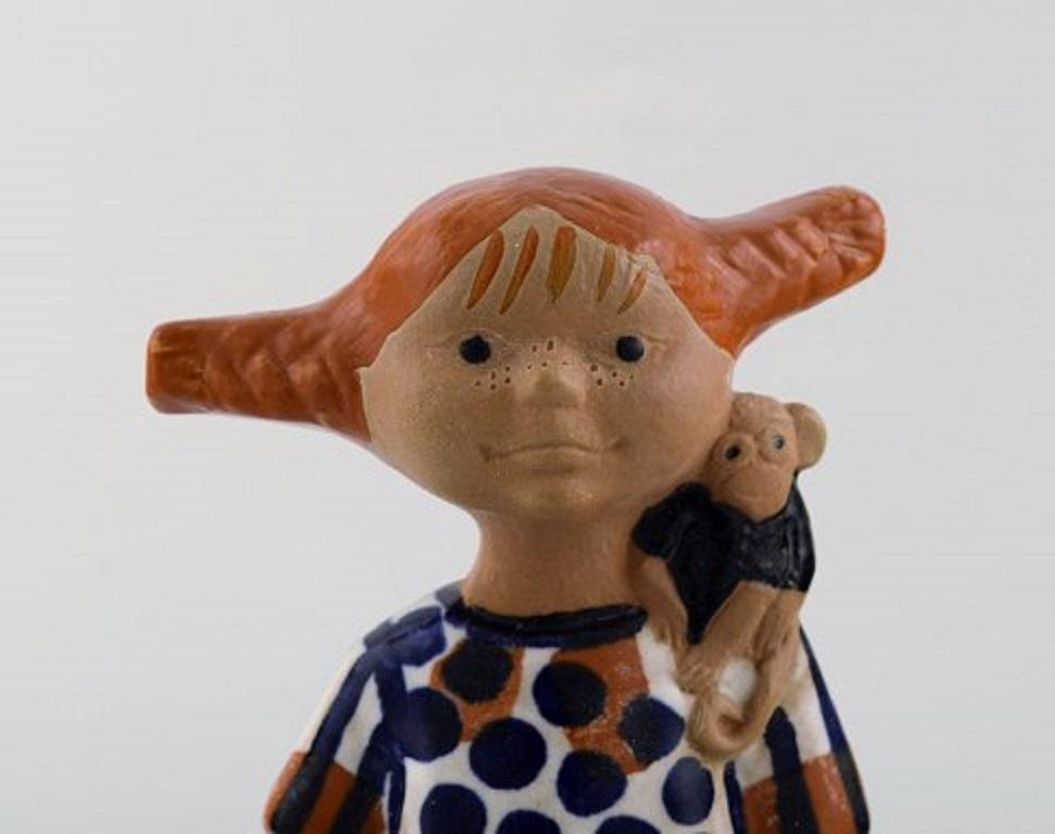 Lisa Larsson, very rare Pippi Longstocking figure, 1970s.
Gustavsberg Swedish ceramic figure decorated with glaze.
Height 18.5 cm.
Stamped.
Perfect condition.
Lisa Larson (born 1931) was educated in Gothenburg and worked at Gustavsberg in the