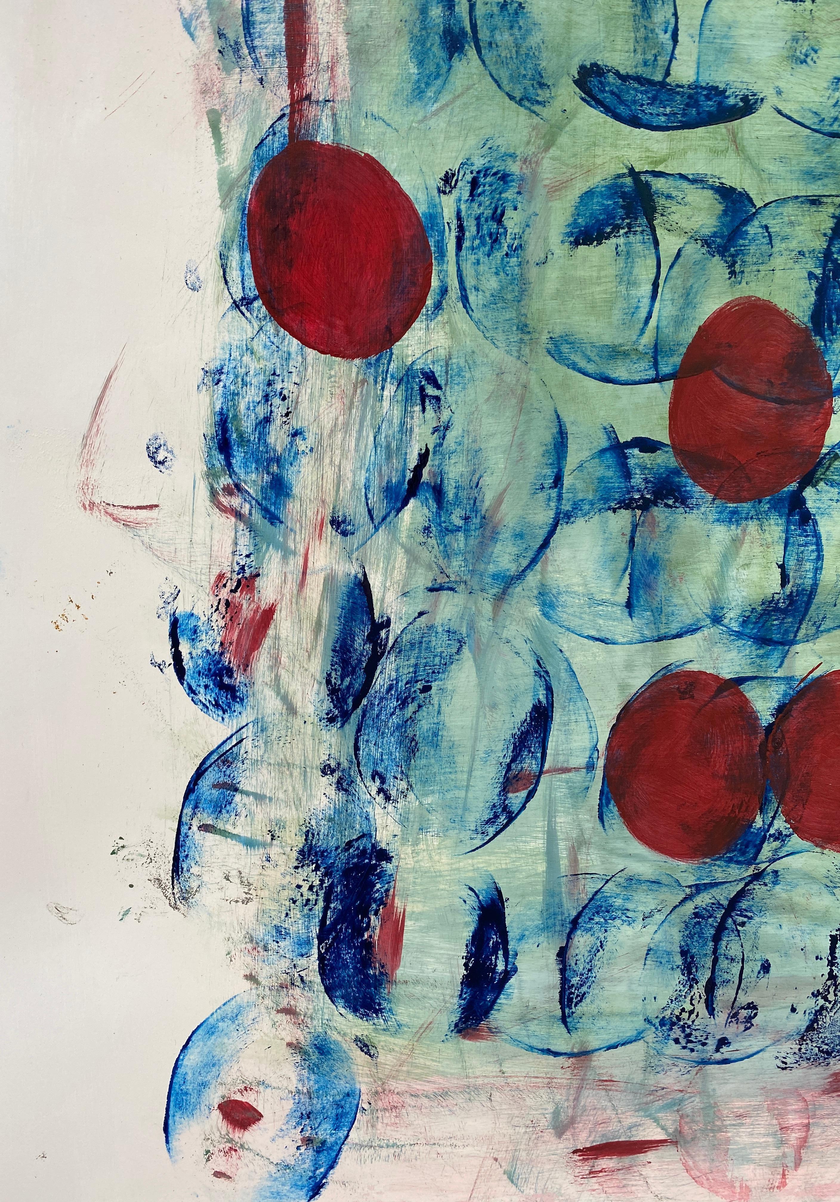 Cette peinture abstraite de bleus et de rouges sur papier a une touche océanique.  L'image d'un poisson est révélée sur le côté gauche du tableau.  Les cercles représentent le cycle des saisons.  Mon objectif était de procurer au spectateur un