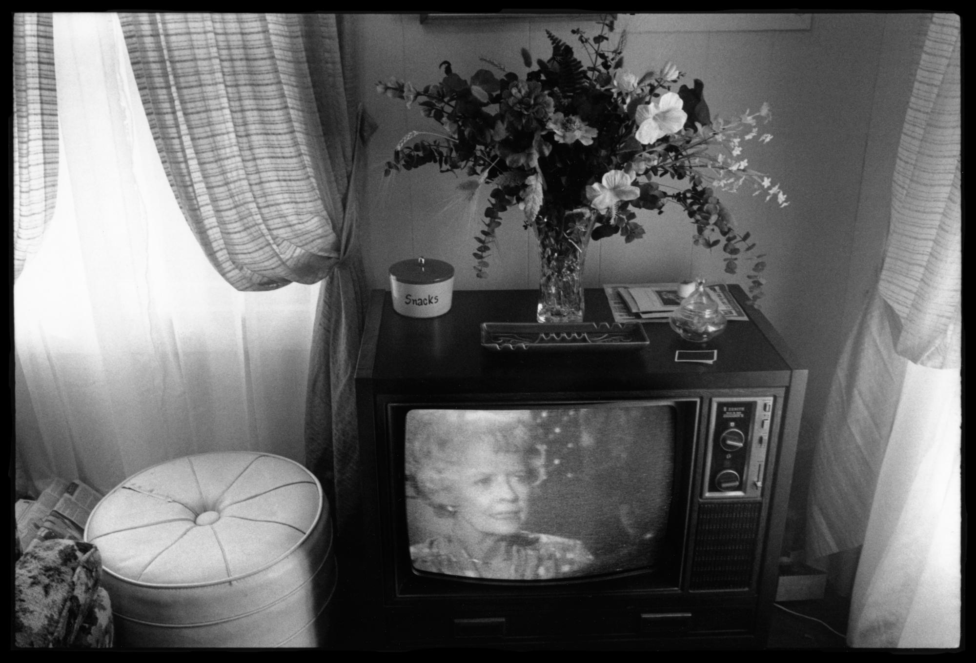 Lisa McCord Black and White Photograph - Watching Soap Operas at Cully's