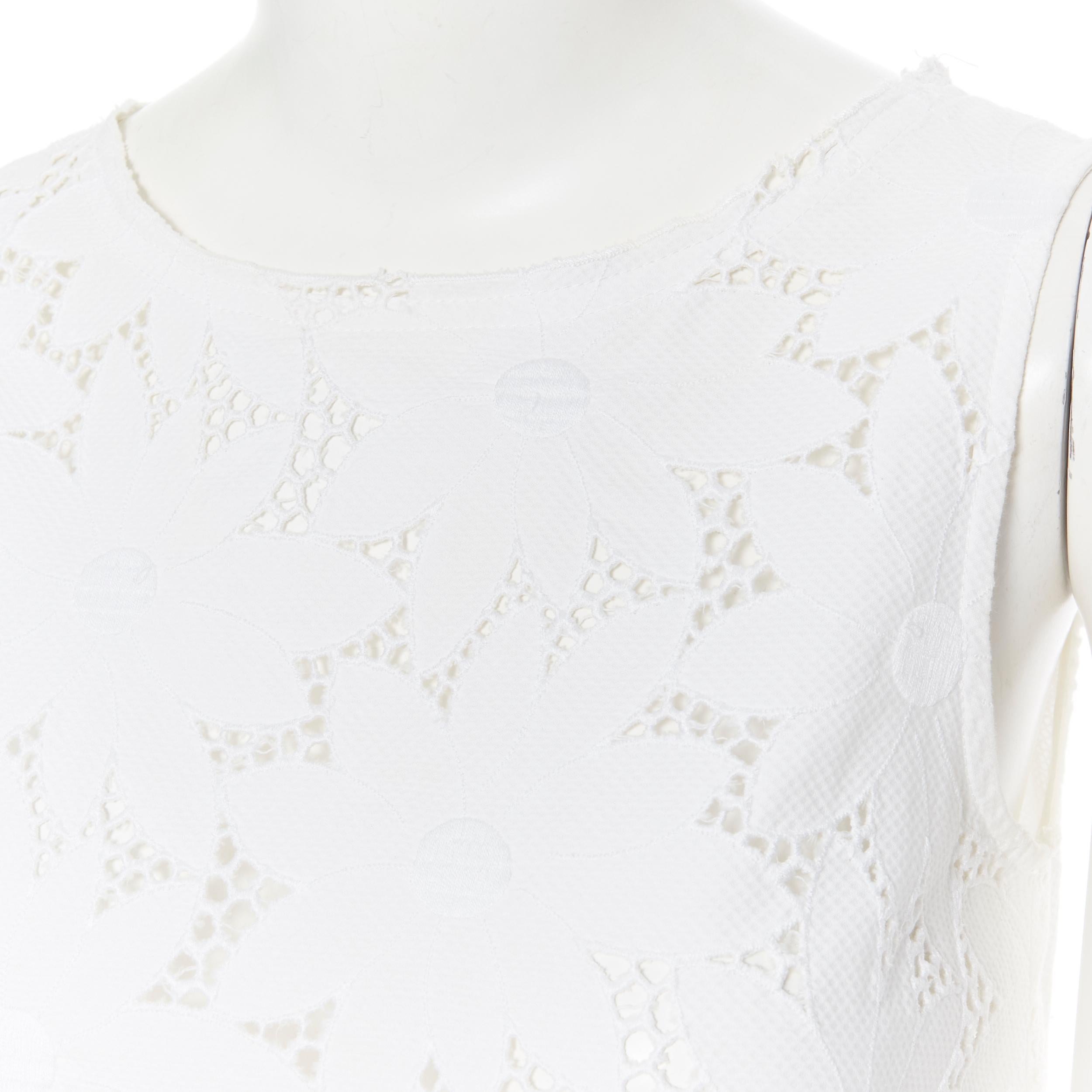 LISA PERRY 100% cotton white floral embroidery anglaise A-line sleeveless top S 
Reference: LNKO/A01260 
Brand: Lisa Perry 
Material: Cotton 
Color: White 
Pattern: Floral 
Extra Detail: Floral embroidery anglaise. Wide neckline. A-line cut. 
Made