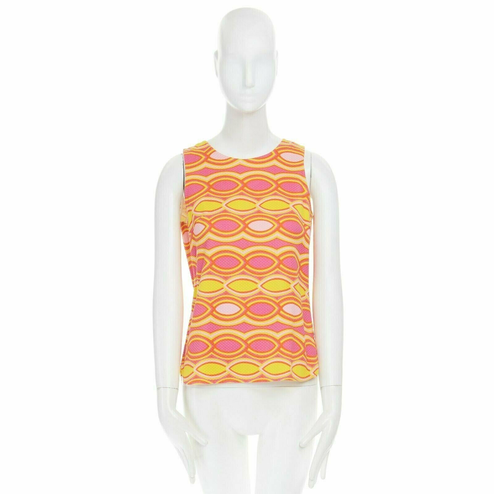 LISA PERRY 60s mod con pink yellow geometric print textured cotton top US2 UK6 S 
Reference: LNKO/A00238 
Brand: Lisa Perry 
Material: Cotton 
Color: Pink 
Pattern: Geometric 
Extra Detail: 100% cotton. Late 60's ModCon inspired. Pink and yellow