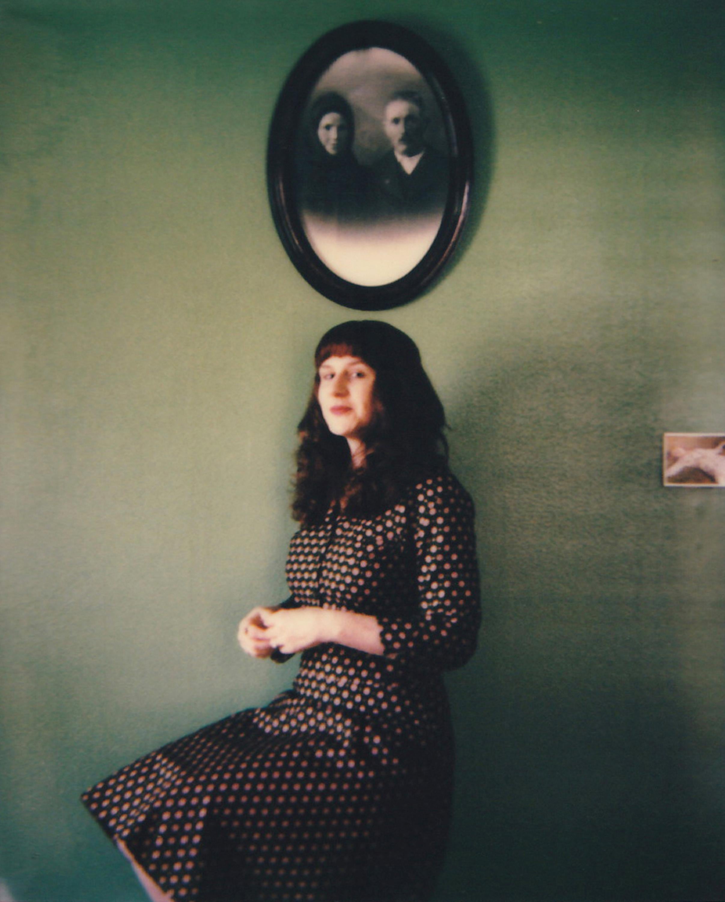 Lisa Toboz Color Photograph - Self-portrait at the Green Wall - Contemporary, Woman, Polaroid, 21st Century