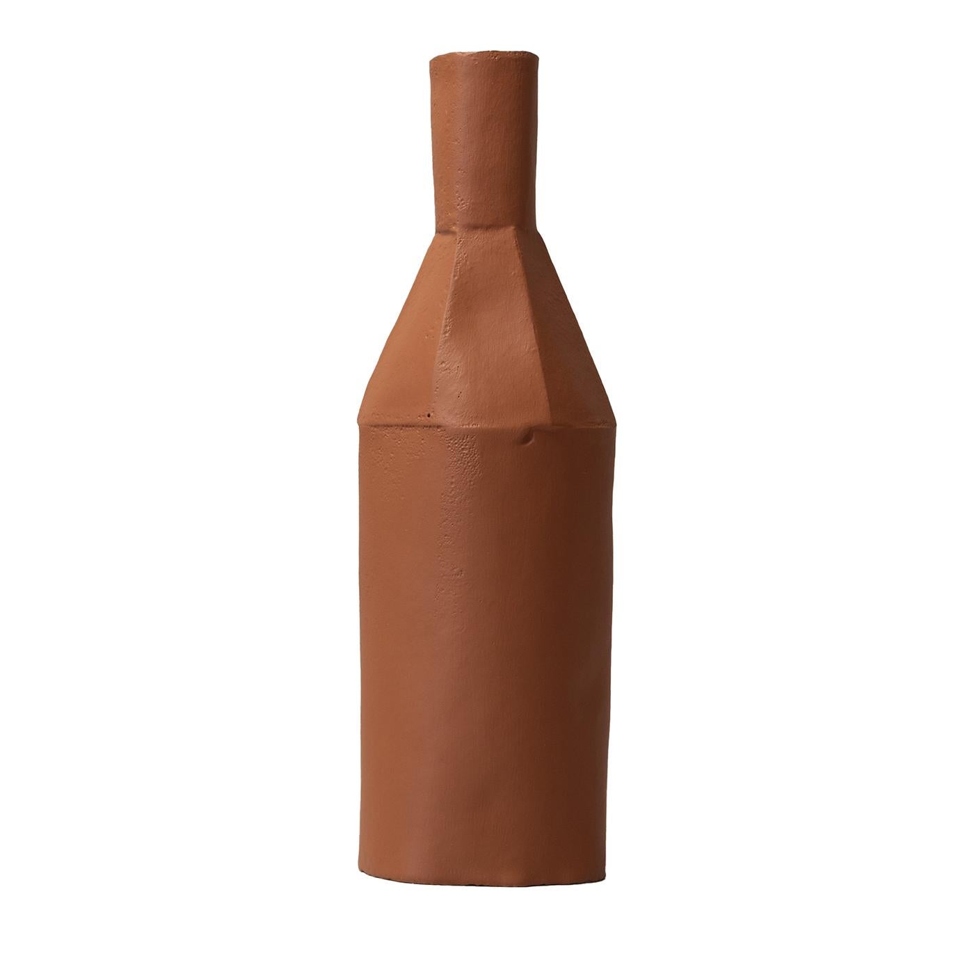 This decorative bottle features a sleek, tall silhouette that adds modern elegance to any space. Made from paper clay with fiber inclusions, its texture offers unique tactile qualities. Each piece varies slightly, ensuring distinctiveness. Finished