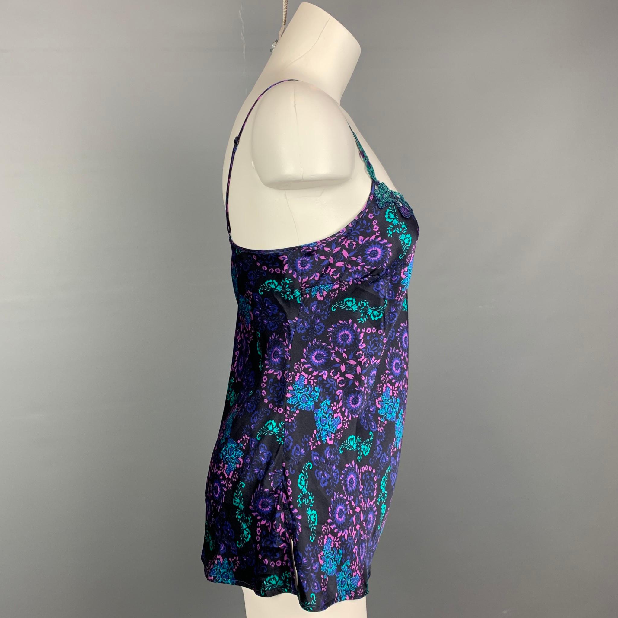 LISE CHARMEL casual top comes in a black & purple print silk / polyester with a lace trim featuring spaghetti straps. Made in Bulgaria.

Very Good Pre-Owned Condition.
Marked: FR 42 / IT 3 / EU 40 / US M / UK M

Measurements:

Bust: 34 in.
Length:
