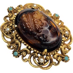 Lisner Gold Tone Cameo Style Brooch with Faux Pearl and Turquoise Accents
