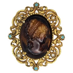 Lisner Gold Tone Cameo Style Brooch with Faux Pearl and Turquoise Accents