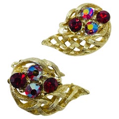LISNER vintage gold tone ruby rhinestone leaf designer clip on earrings