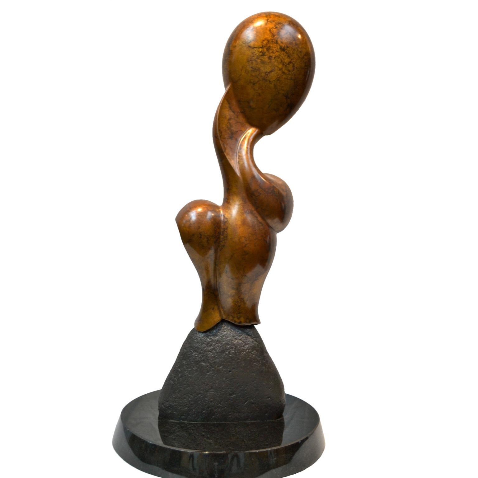A sensuous looking modern bronze sculpture on a black marble base called 