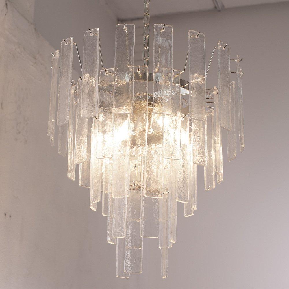 Pendant Lamp in Murano Glass, clear listelli chandelier, Italy

Additional information:
Material: Brass, Glass, Murano Glass
Design period: 1970 - 1979
Country of production: Italy
Condition: Restored — This vintage/antique item is in excellent