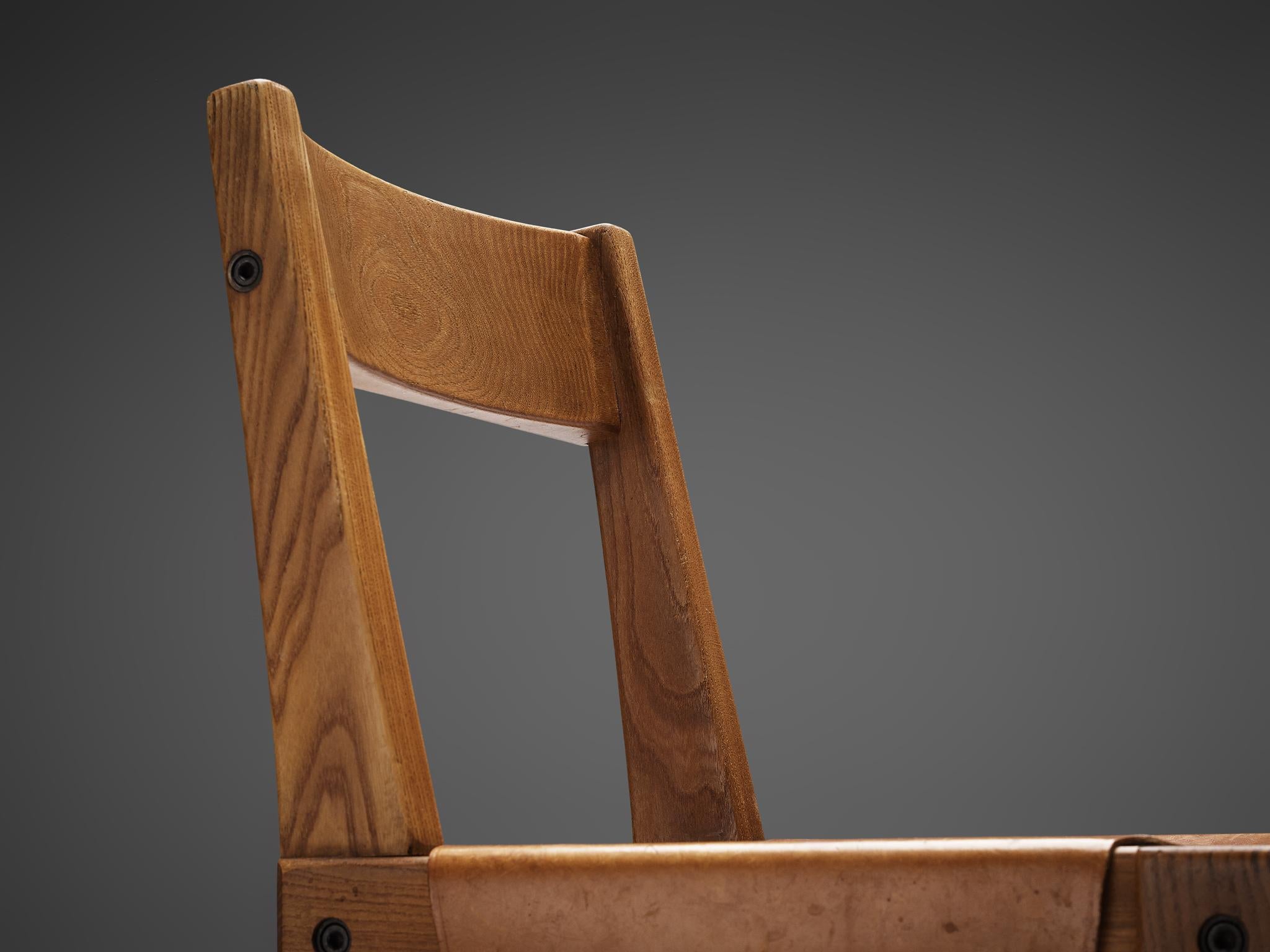 French Listing for T: Eight Pierre Chapo 'S24' Chairs in Solid Elm and Cognac Leather