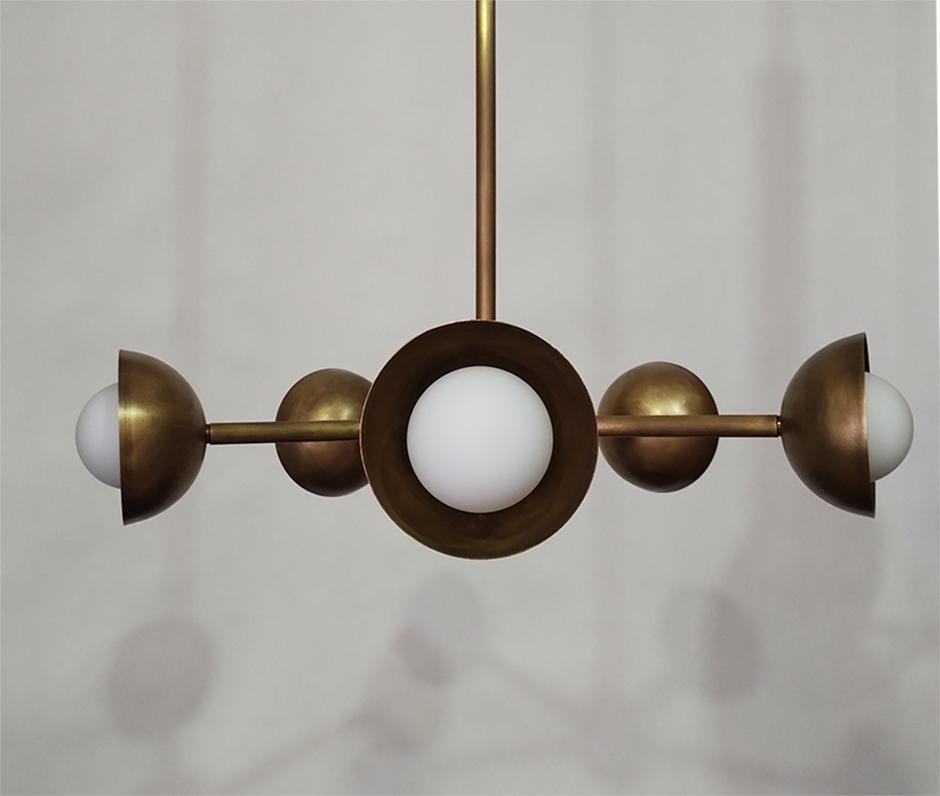Five arms chandelier made of solid brass and spherical glass shades. Finished and assembled by hand. 
Lita can be customized on request (dimensions, materials, number of arms).
Although default production time is 1-2 weeks, we may have items in