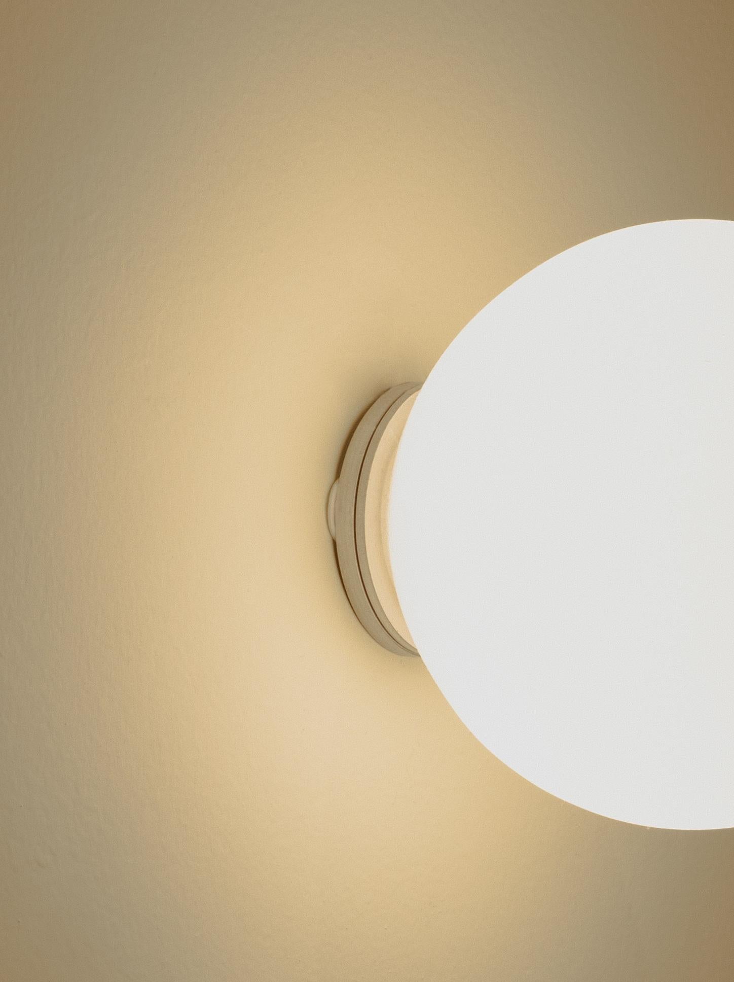 Blackened Lita Wall Sconce in Brushed Brass with Opaline Sphere Glass by Nuumbra For Sale