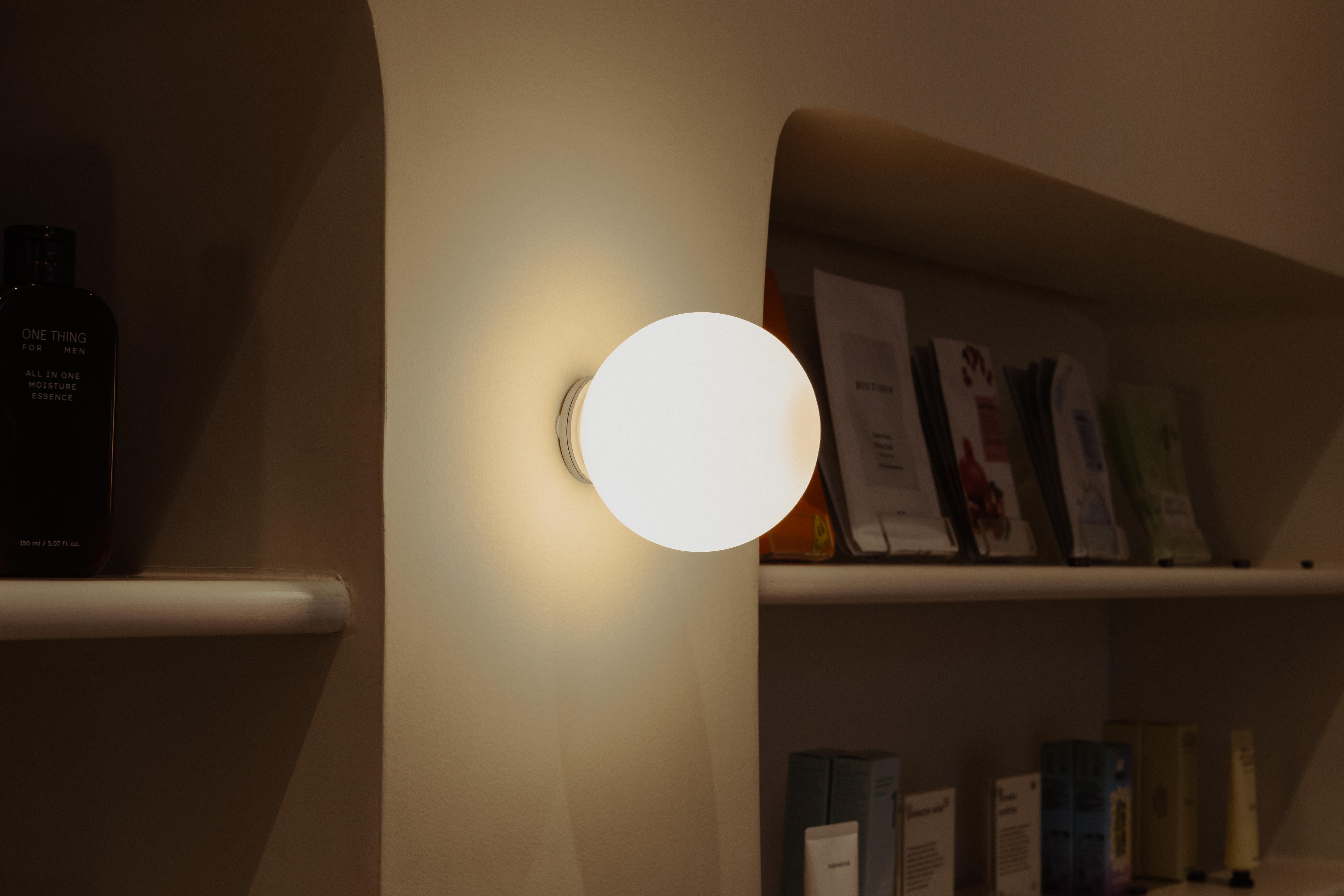 Lita Wall Sconce in Brushed Brass with Opaline Sphere Glass by Nuumbra In New Condition For Sale In Geneve, CH
