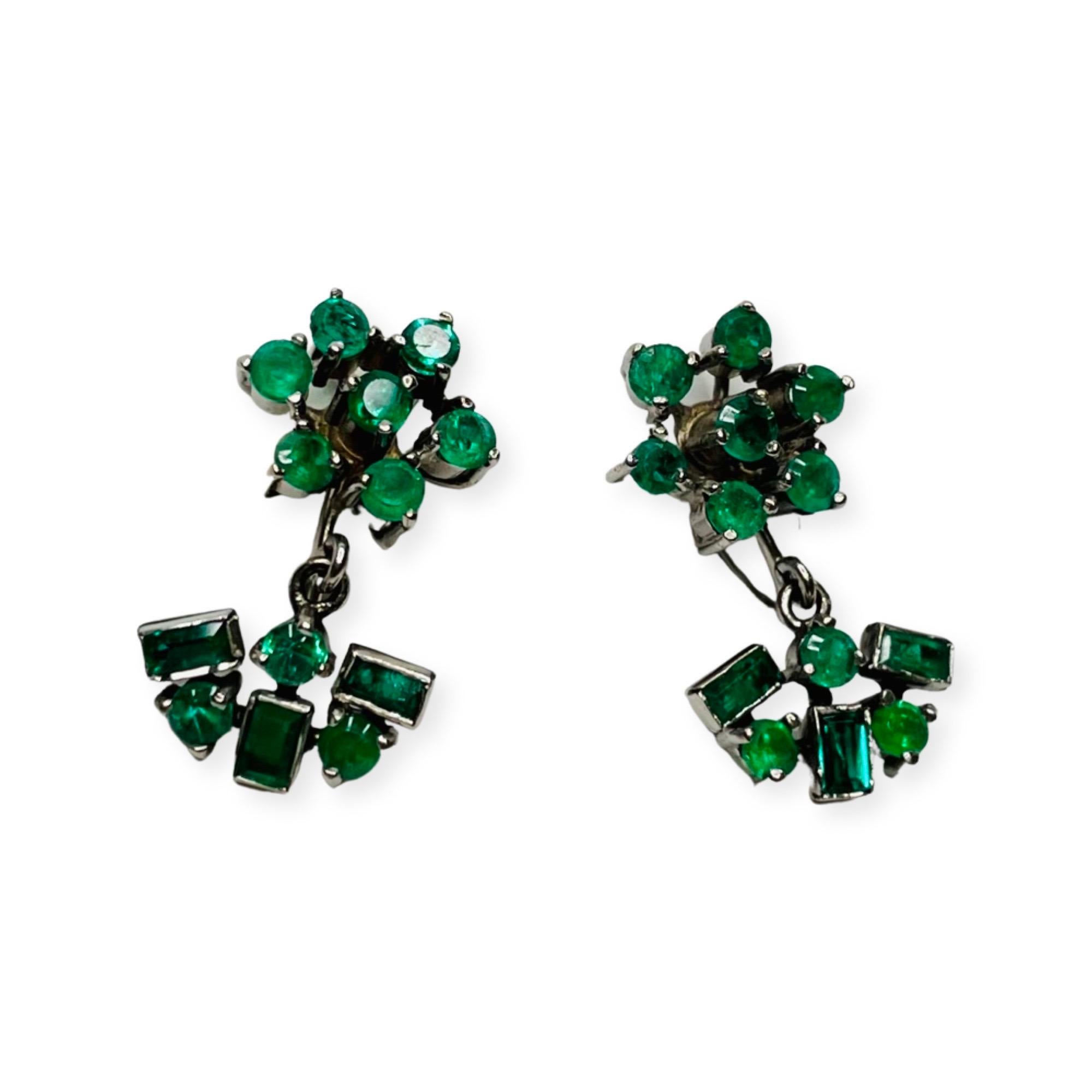 Lithos 14K White Gold Natural Emerald Earrings for Non Pierced Ears. There are 20 round cut emeralds, prong set, for a total weight of 1.80 carats and 6 baguette emeralds, bezel set, for a total weight of 0.48 carats. The total emerald weight is