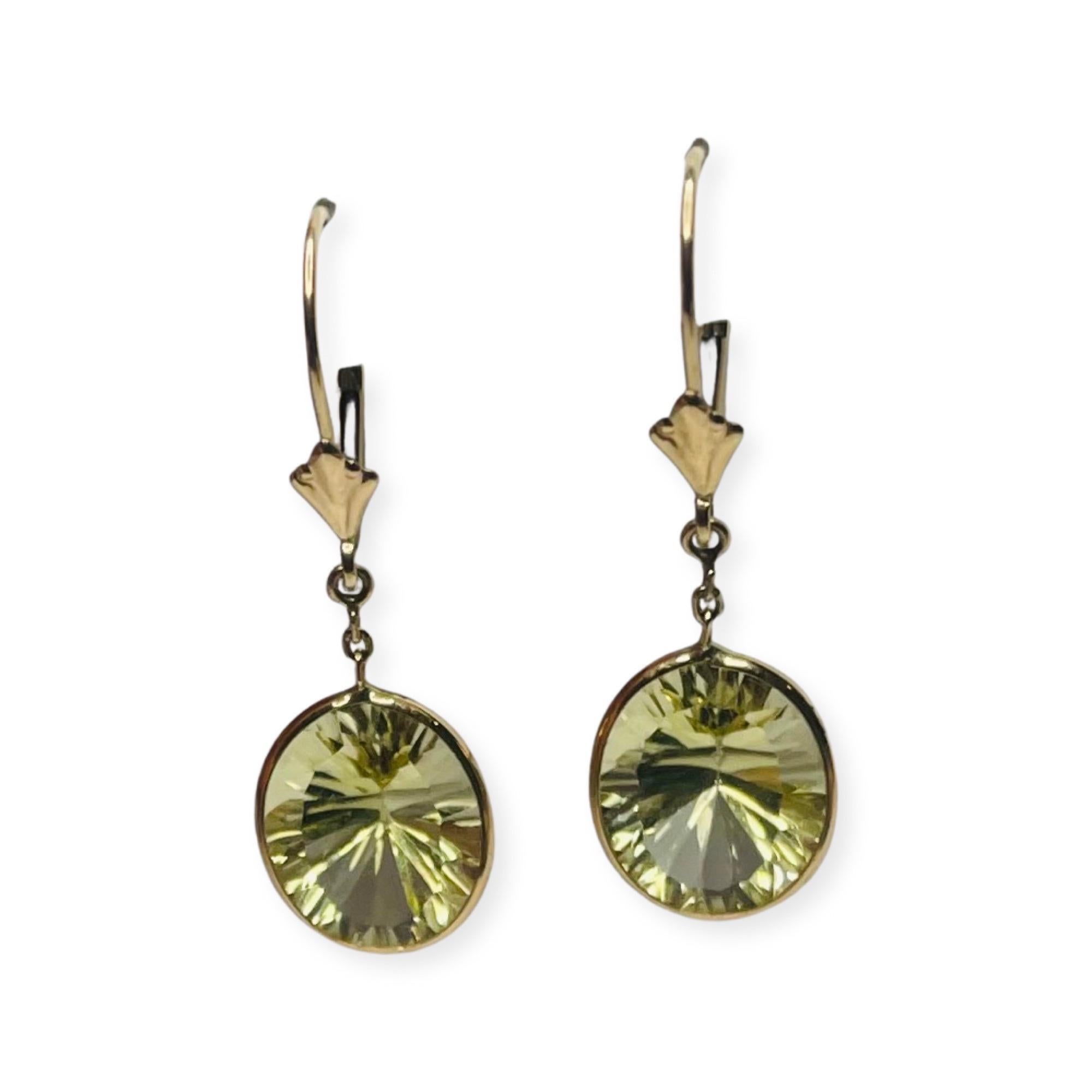 Lithos 14K Yellow Gold Lemon Quartz Earrings. They are 12.0 mm x 10.0 mm. They are bezel set. They hang from French wires. 
400-70-842