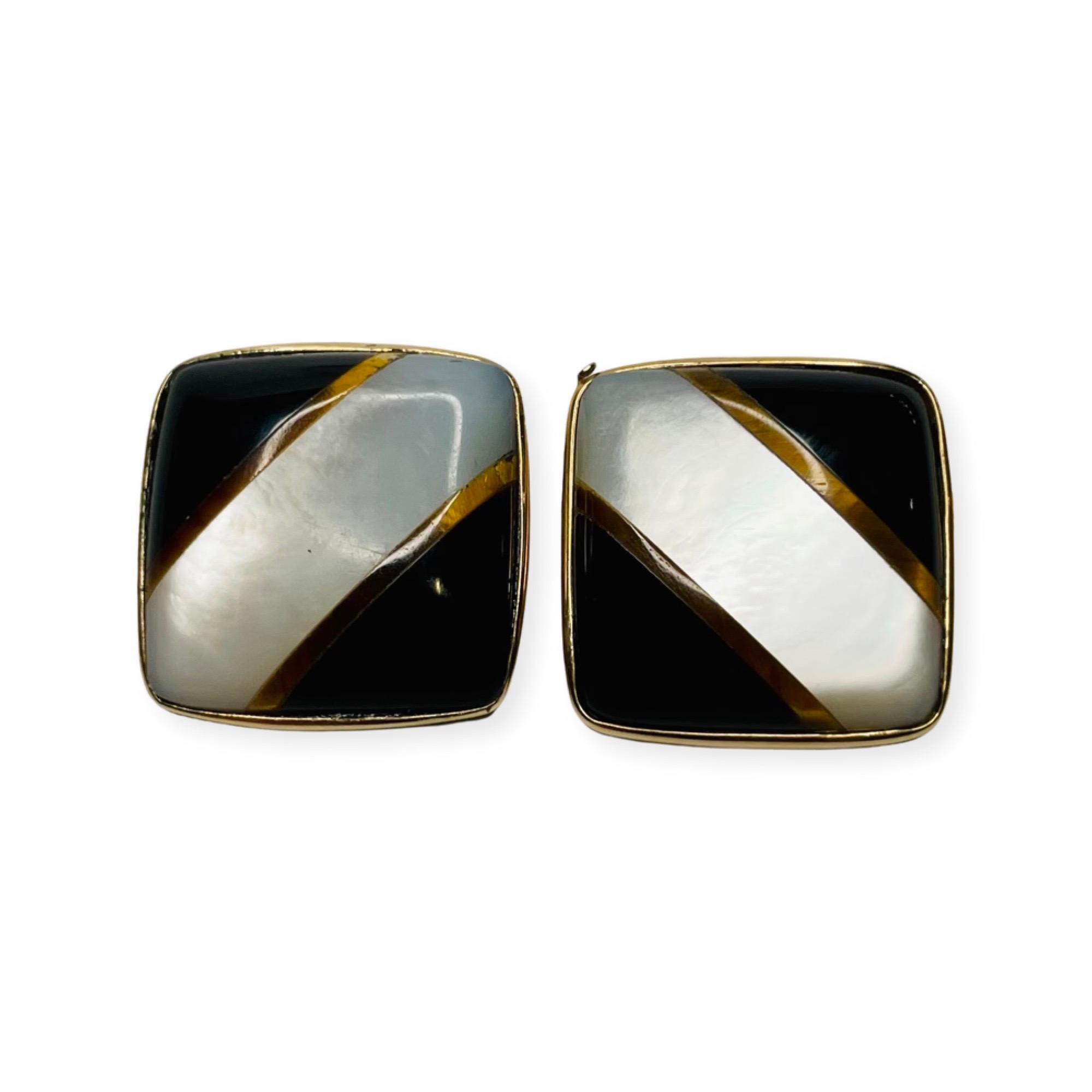 Lithos 18K Yellow Gold Inlaid Onyx and Mother of Pearl Earrings. They measure 19.0 mm X 18.58 mm. There have strips of 18K yellow gold in between the inlaid onyx and mother of pearl.  They are bezel set. The earrings have posts and earring backs. 