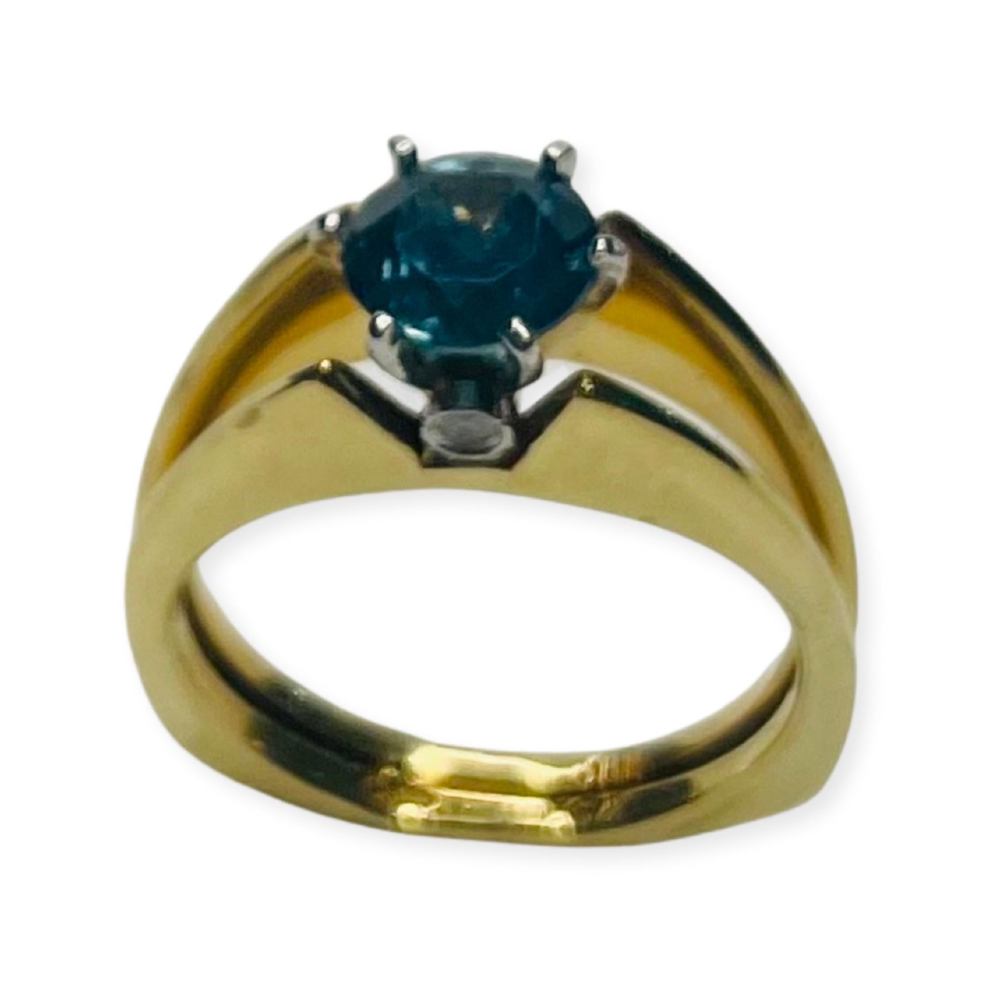 Contemporary Lithos 18K Yellow Gold, Platinum, and Montana Sapphire Ring For Sale