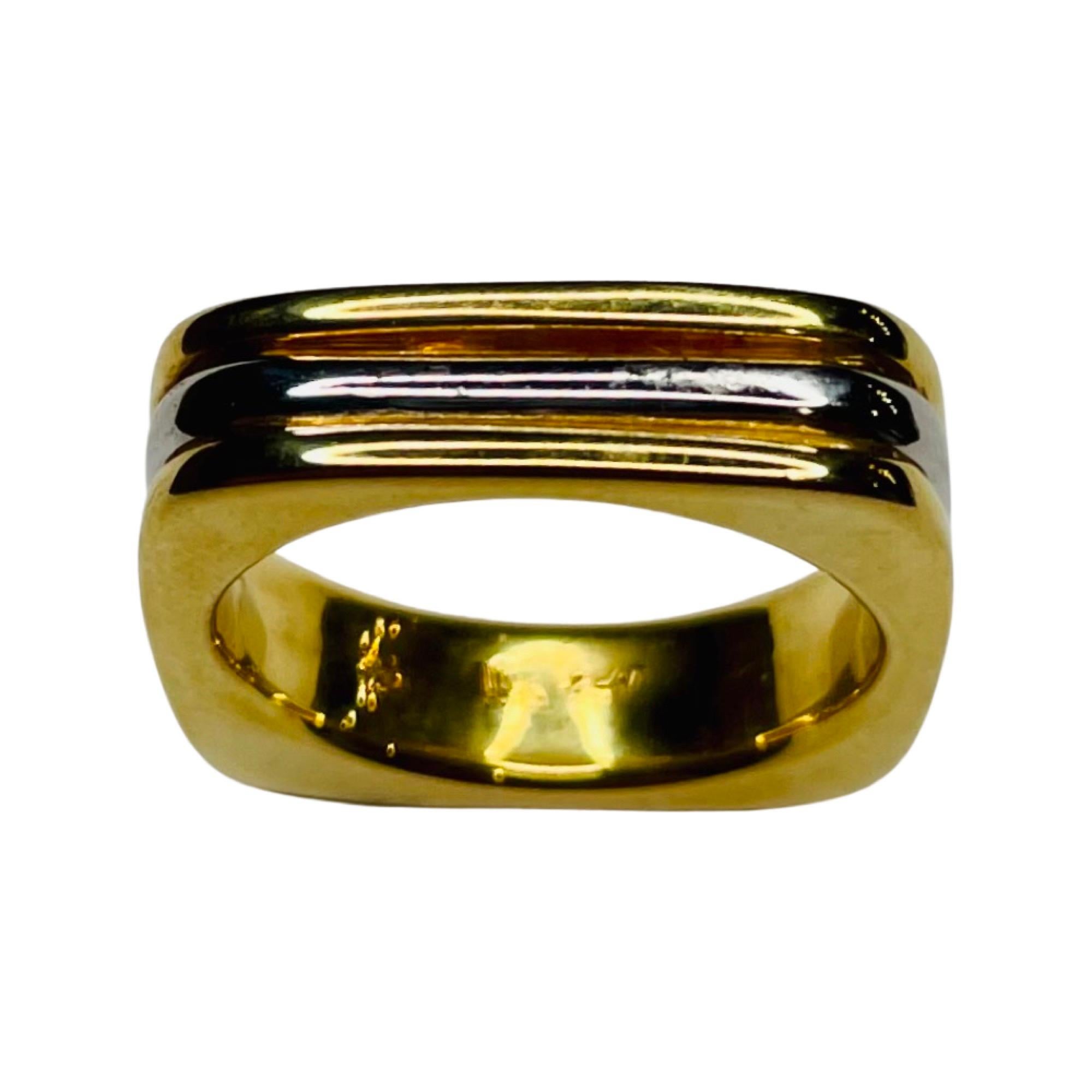 Lithos Platinum 18K Yellow Gold Wedding Band. This ring is 5.48 mm wide.  It is comfort fit. It is finger size 6.25 but we can size this for an additional fee. It is a square ring.
100-90-398