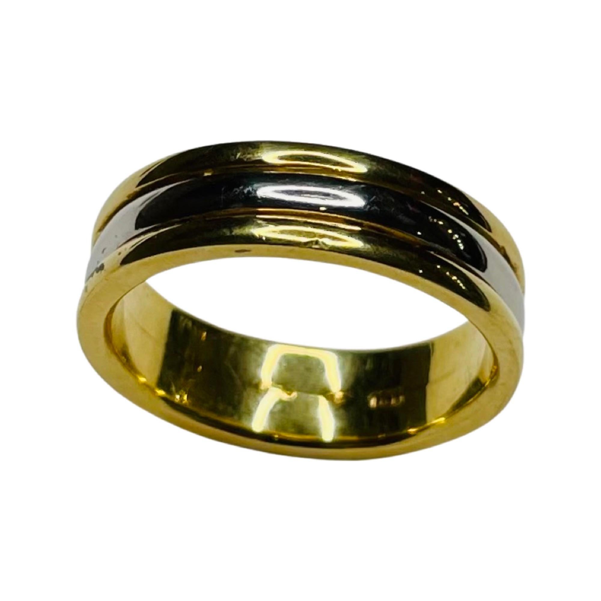 Lithos Platinum and 18K Yellow Gold Wedding Band. This ring is 6.4 mm wide. It is comfort fit. It is finger size 10.5 but we can size this for an additional fee. 
100-90-396 