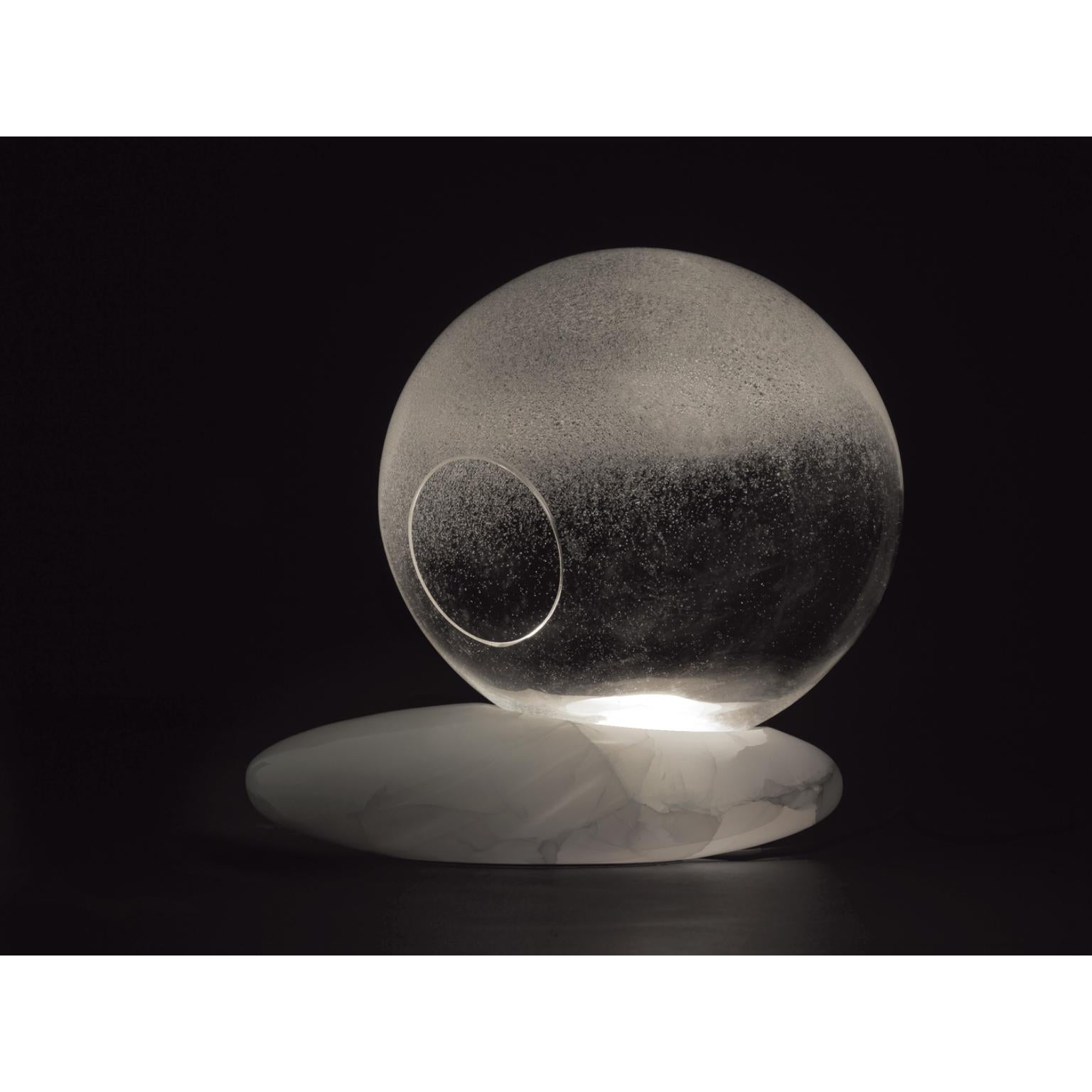 Litia Round Table Lamp by Kreoo 
Designed by Enzo Berti
Dimensions: Ø 36 x H 39 cm.
Materials: Light Sky onyx and Pelugoso glass.

Available in different onyx and glass options. Available in an oval and a round version. Please contact us.

All our