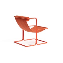 Lito lounge chair with textile seating & stainless steel frame by Joyf