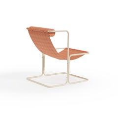 Lito lounge chair with textile seating & stainless steel frame by Joyf