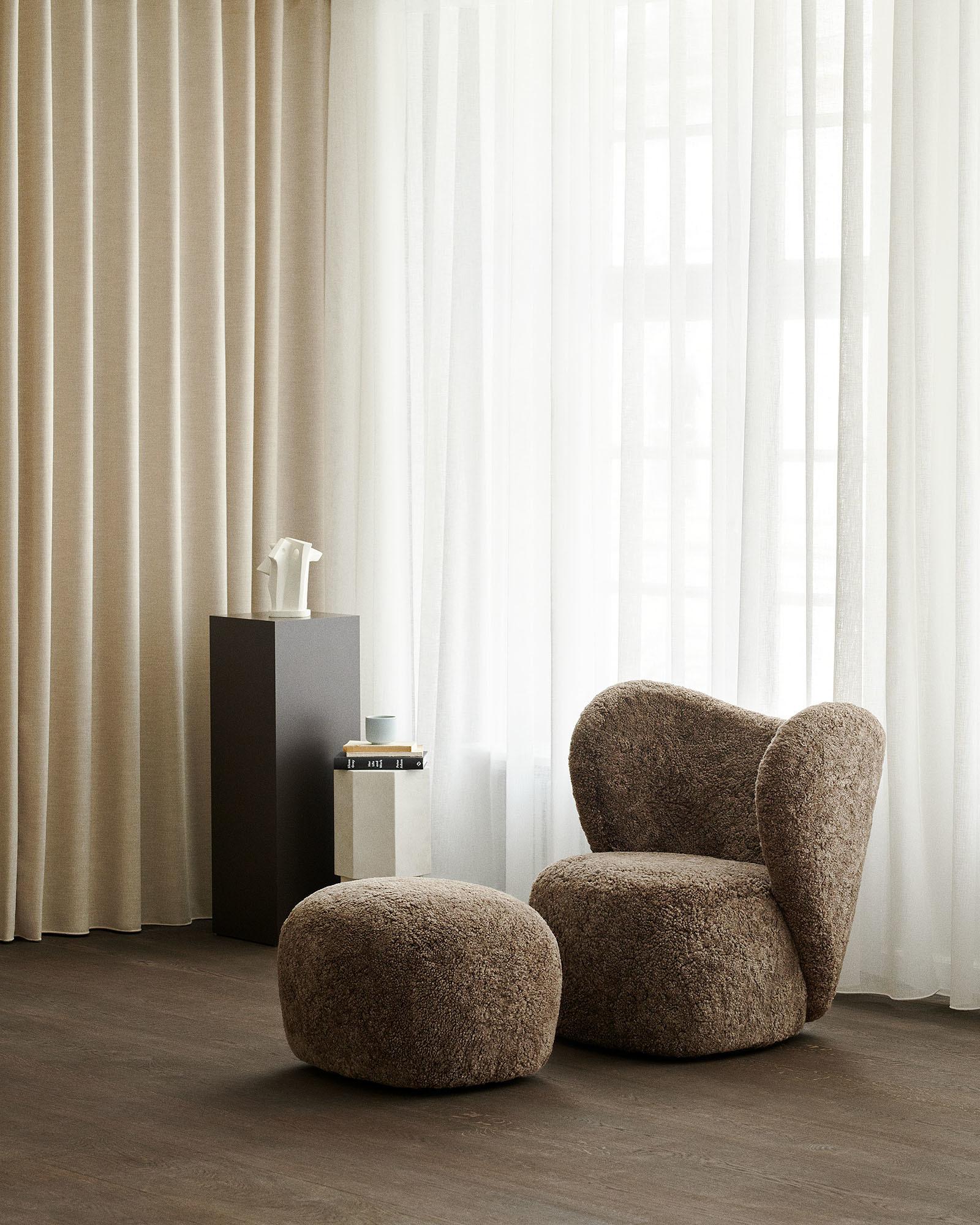 Little big armchair x2 + little big pouf x1
Signed by Kristian Sofus Hansen and Tommy Hyldahl for Norr11. 

Model shown on the picture:
Fabric: Sheepskin (Off-White)
Made in Italy

Dimensions: 
- Little big pouf: W 60 cm / D 50 cm / H 39 cm
- Little