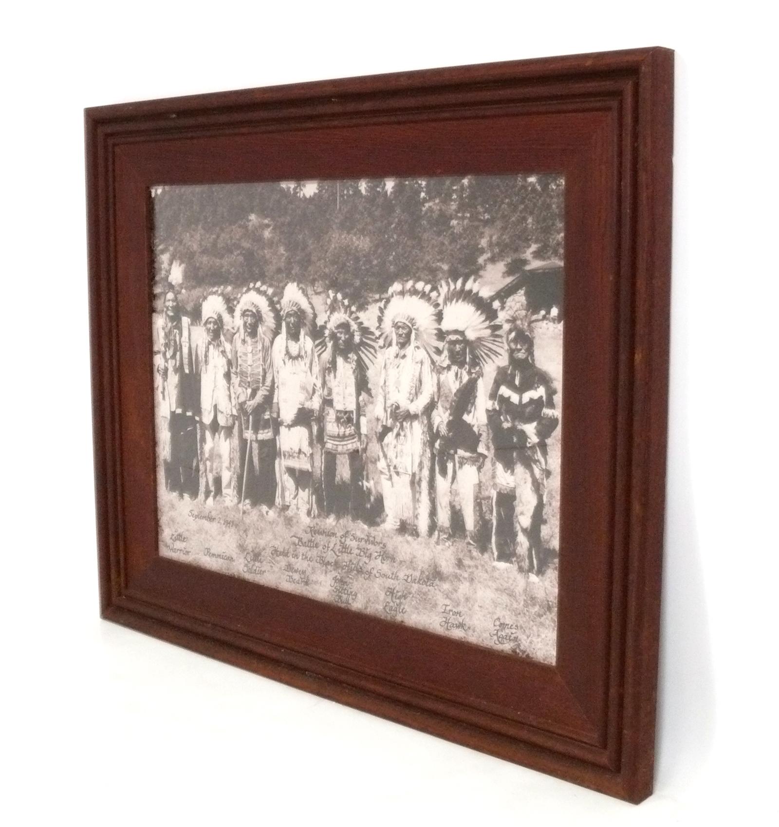 Gelatin silver photograph of “The Battle of the Little Bighorn Survivors”, by Bill Groethe, American, circa 1948. Recently professionally framed in a vintage clean lined Mission oak frame under UV resistant glass. The photograph shows the reunion