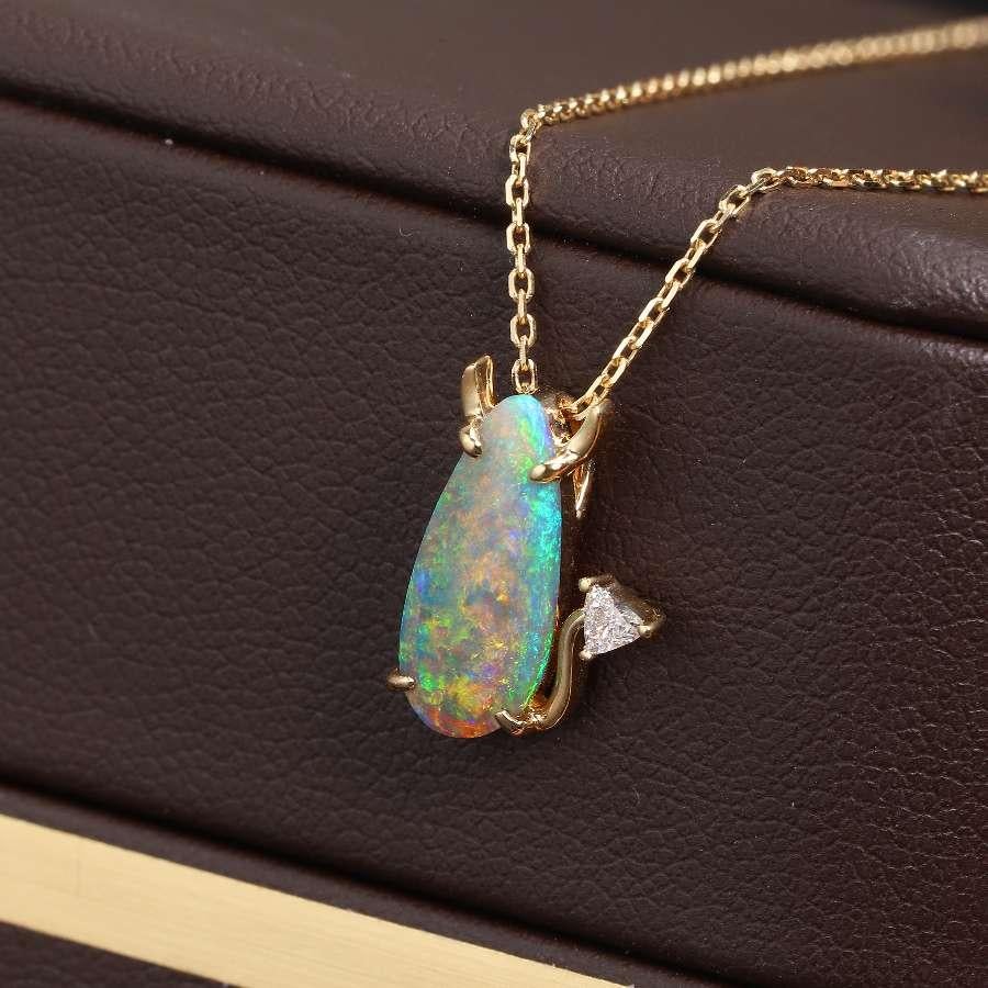 I Love You, Little Devil - Australian Semi-Black Opal Diamond Pendant Necklace 18K Yellow Gold

Design name: I Love You, Little Devil!

Design idea:
I found this supreme semi-black opal with a gorgeous play of rainbow colors. I felt so much love in