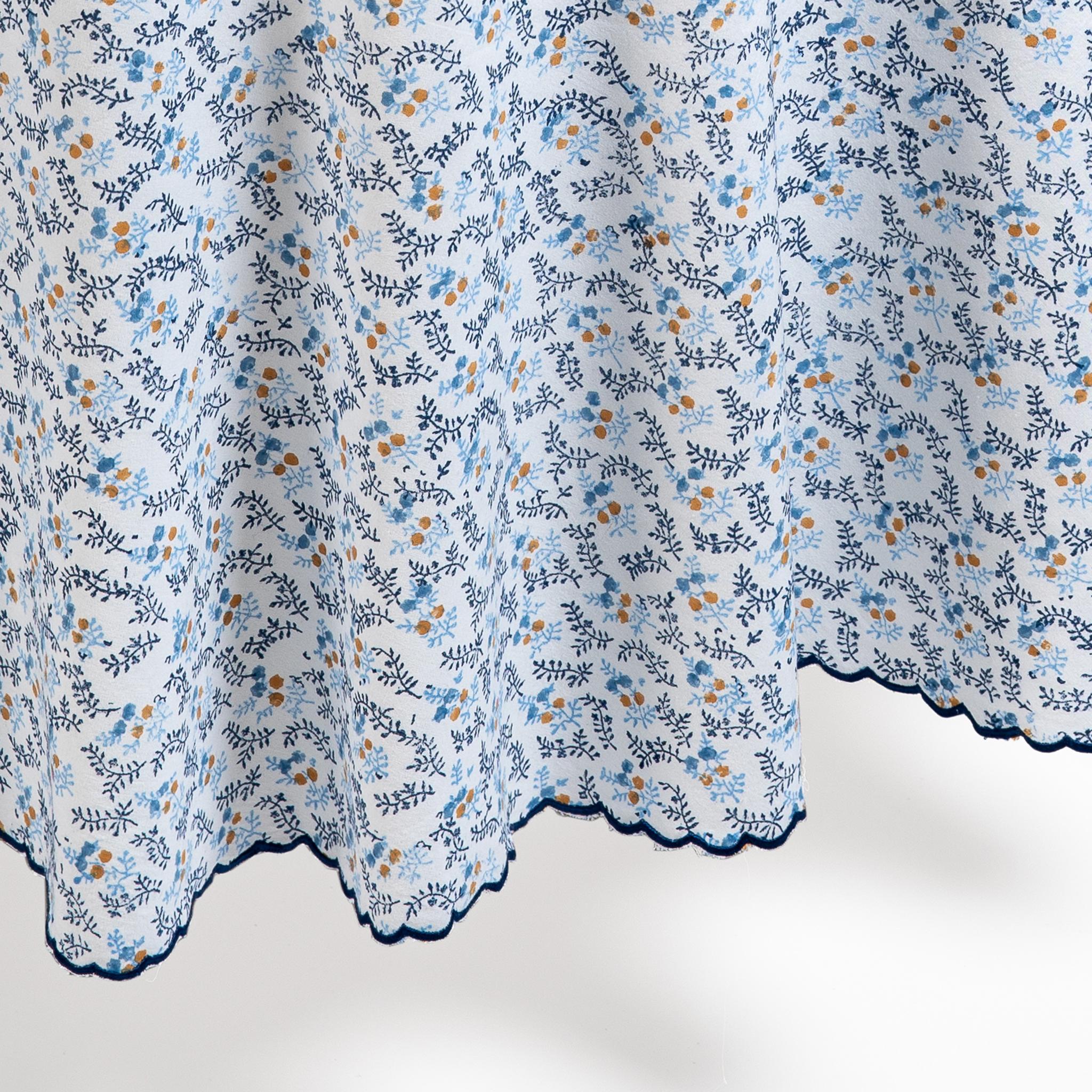 Our Little Flower collection features a beautiful ditsy floral print, and comes in three colourways: Blue, Green and Maroon. Hand-blocked by artisans onto 100% cotton, the tablecloths are edged with a chic scalloped border. Add a fresh splash of