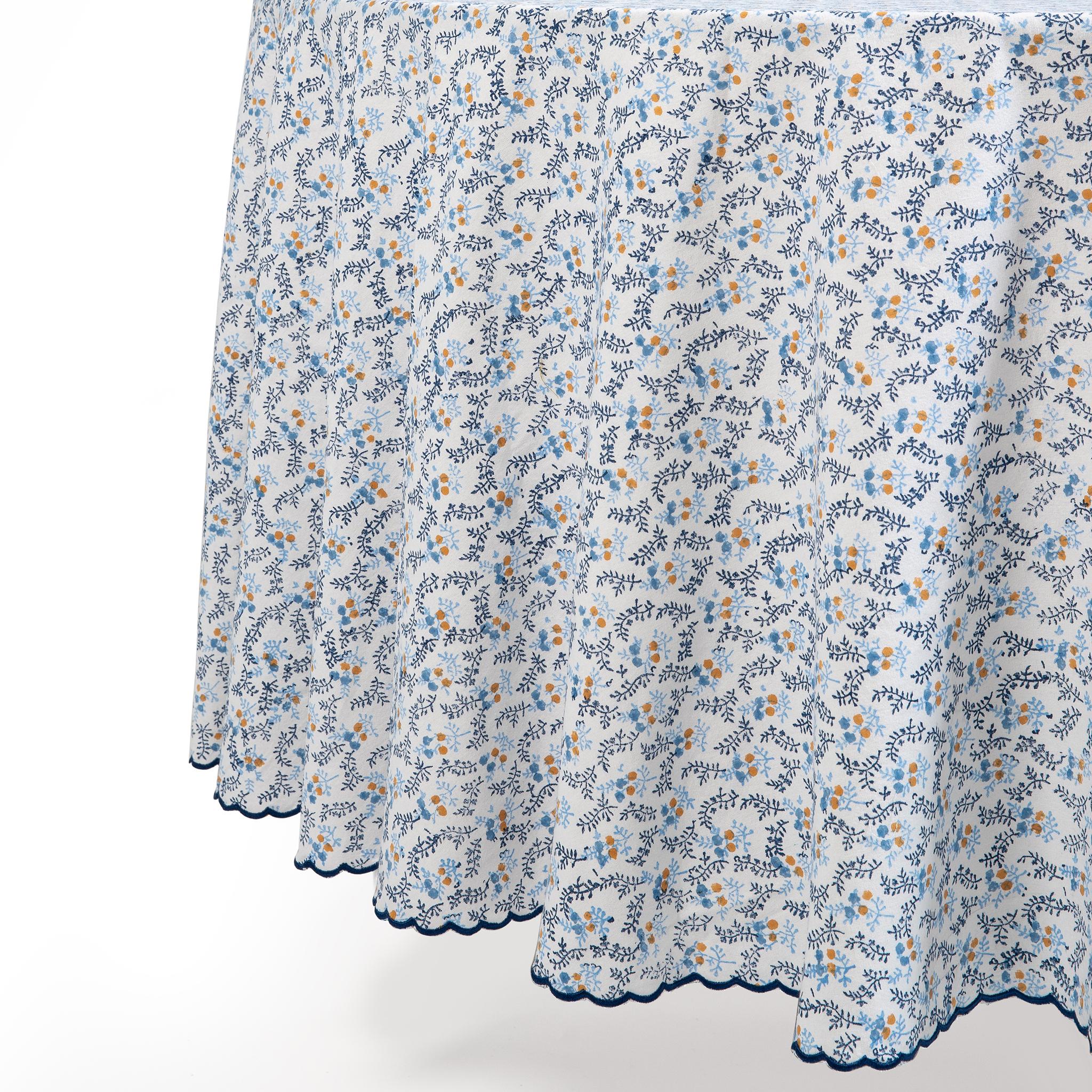 Our Little Flower collection features a beautiful ditsy floral print, and comes in three colourways: Blue, Green and Maroon. Hand-blocked by artisans onto 100% cotton, the tablecloths are edged with a chic scalloped border. Add a fresh splash of