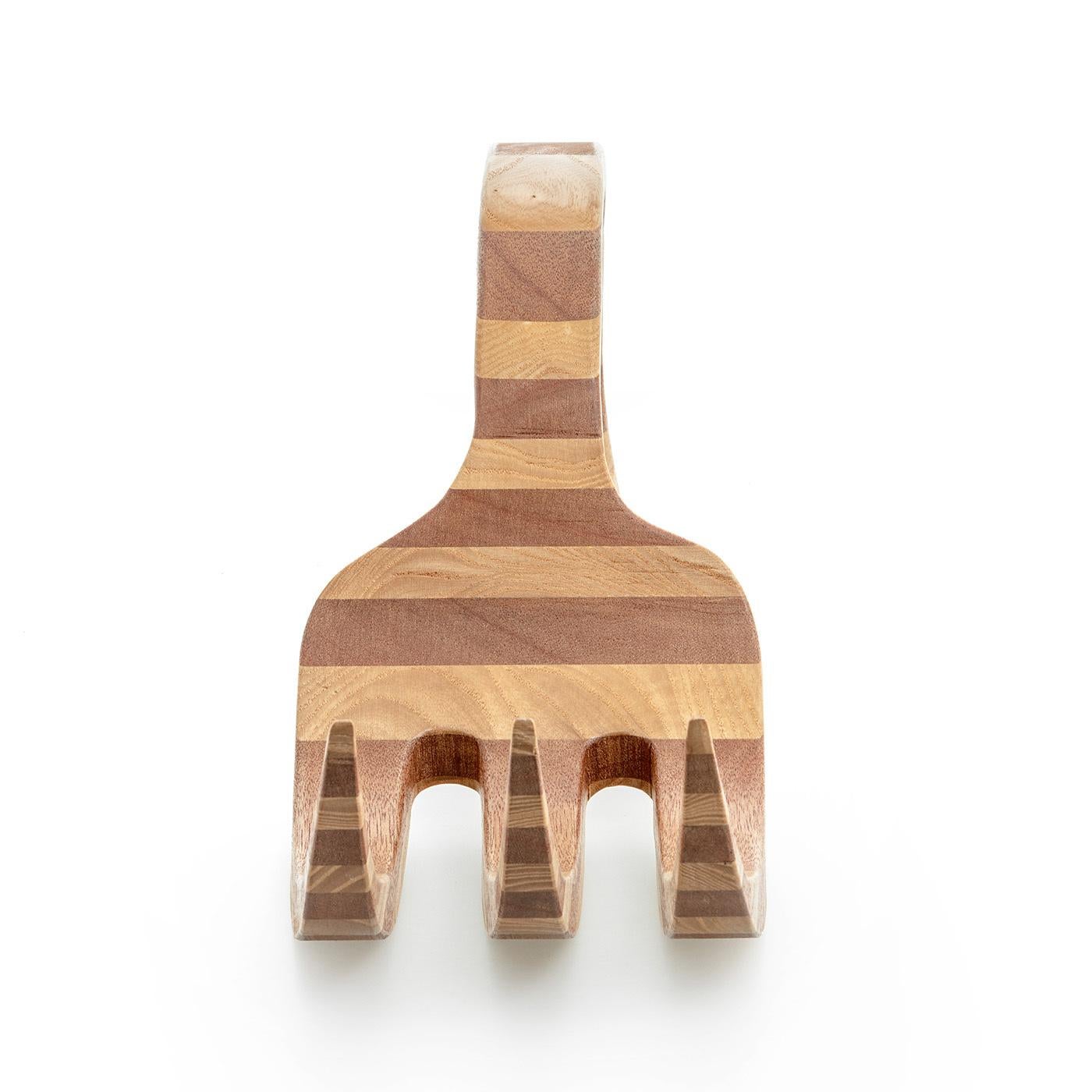 This charming wooden Fork sculpture is entirely handcrafted of prized cherry and pear woods, whose perpendicular stripes accentuate the dramatic curve of the handle. The lovely, two-tone, light and dark color scheme is a delicate finishing touch,