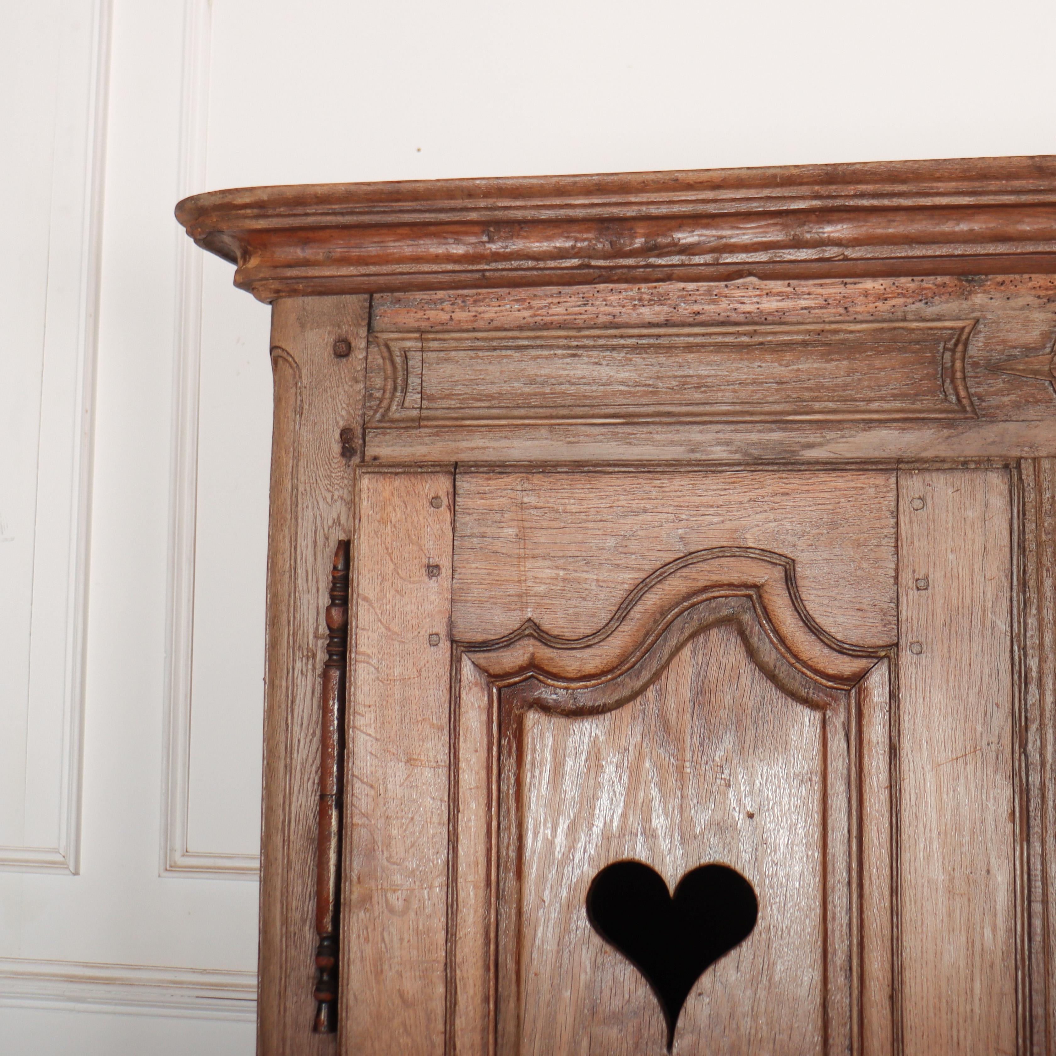 Wonderful little 19th C French bleached oak armoire / linen cupboard with stylised hearts in door panels. 1840.

Reference: 8272

Dimensions
51.5 inches (131 cms) Wide
18.5 inches (47 cms) Deep
74.5 inches (189 cms) High