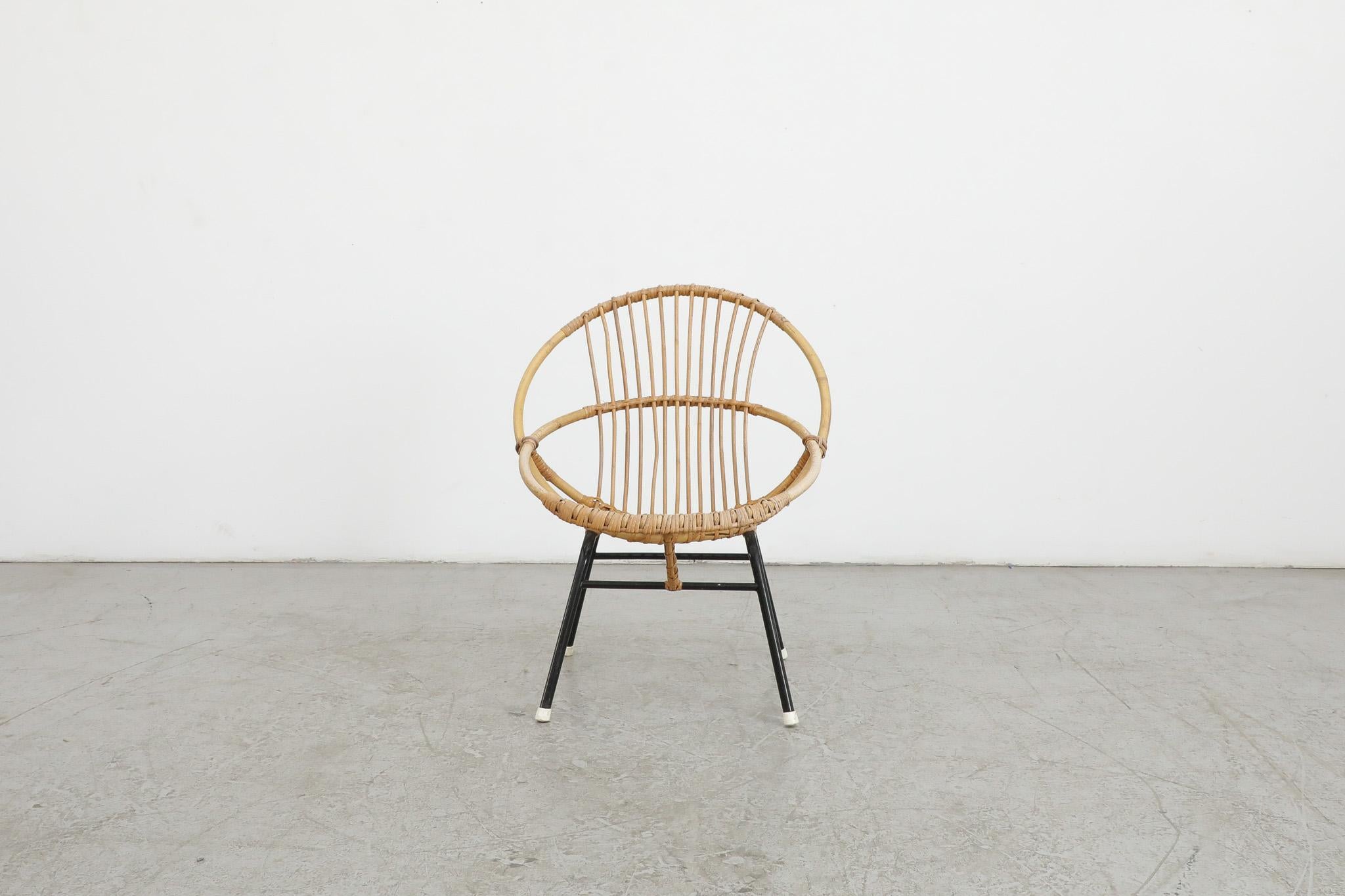 Little Mid-Century bamboo hoop chair by Rohe Noordwolde with Black enameled metal frame and white foot caps. In very original condition with visible wear and some breakage consistent with its age and use. Perfect for outdoors under a dry protected