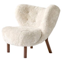 Little Petra Lounge Chair in Sheepskin with oiled Walnut Frame by & Tradition